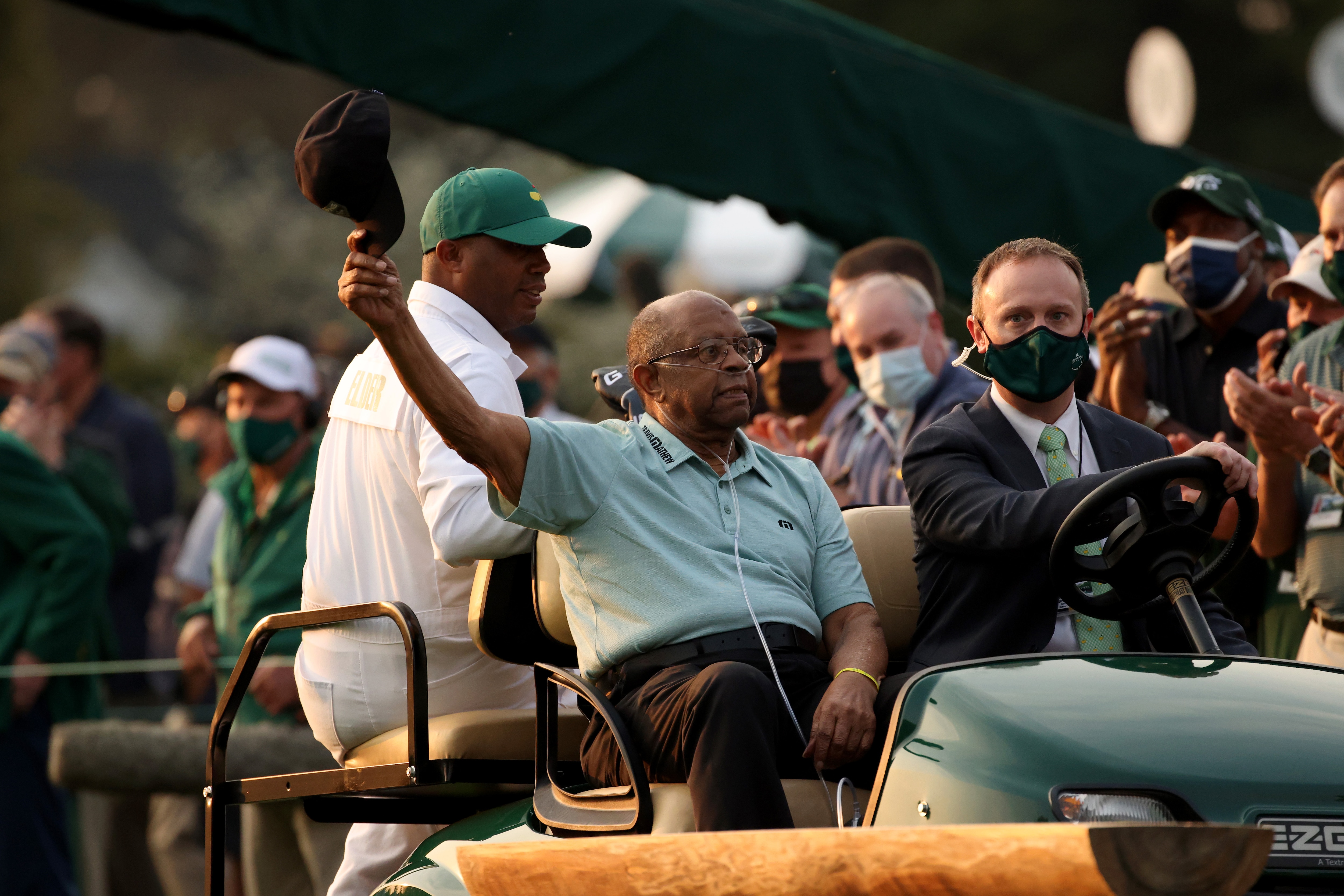 AUGUSTA, GEORGIA - APRIL 08: Honorary Starter Lee Elder of the United States waves to the patrons as he arrives to the opening ceremony prior to the start of the first round of the Masters at Augusta National Golf Club on April 08, 2021 in Augusta, Georgia. (Photo by Kevin C. Cox/Getty Images)