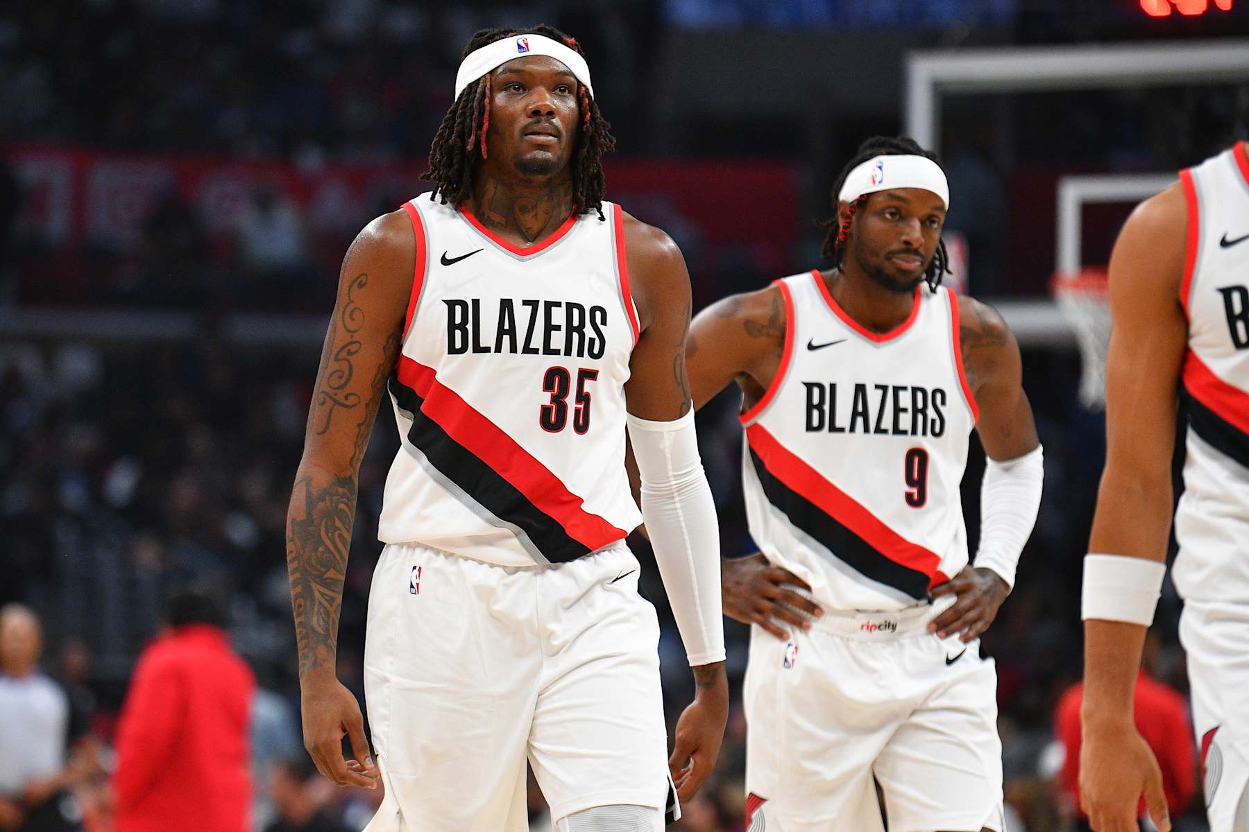 LOS ANGELES, CA - OCTOBER 25: Portland Trail Blazers center Robert Williams III (35) and Portland Trail Blazers forward Jerami Grant (9) look on during a NBA  game between the Denver Nuggets and the Portland Trail Blazers on October 25, 2023 at Crypto.com Arena in Los Angeles, CA. (Photo by Brian Rothmuller/Icon Sportswire via Getty Images)