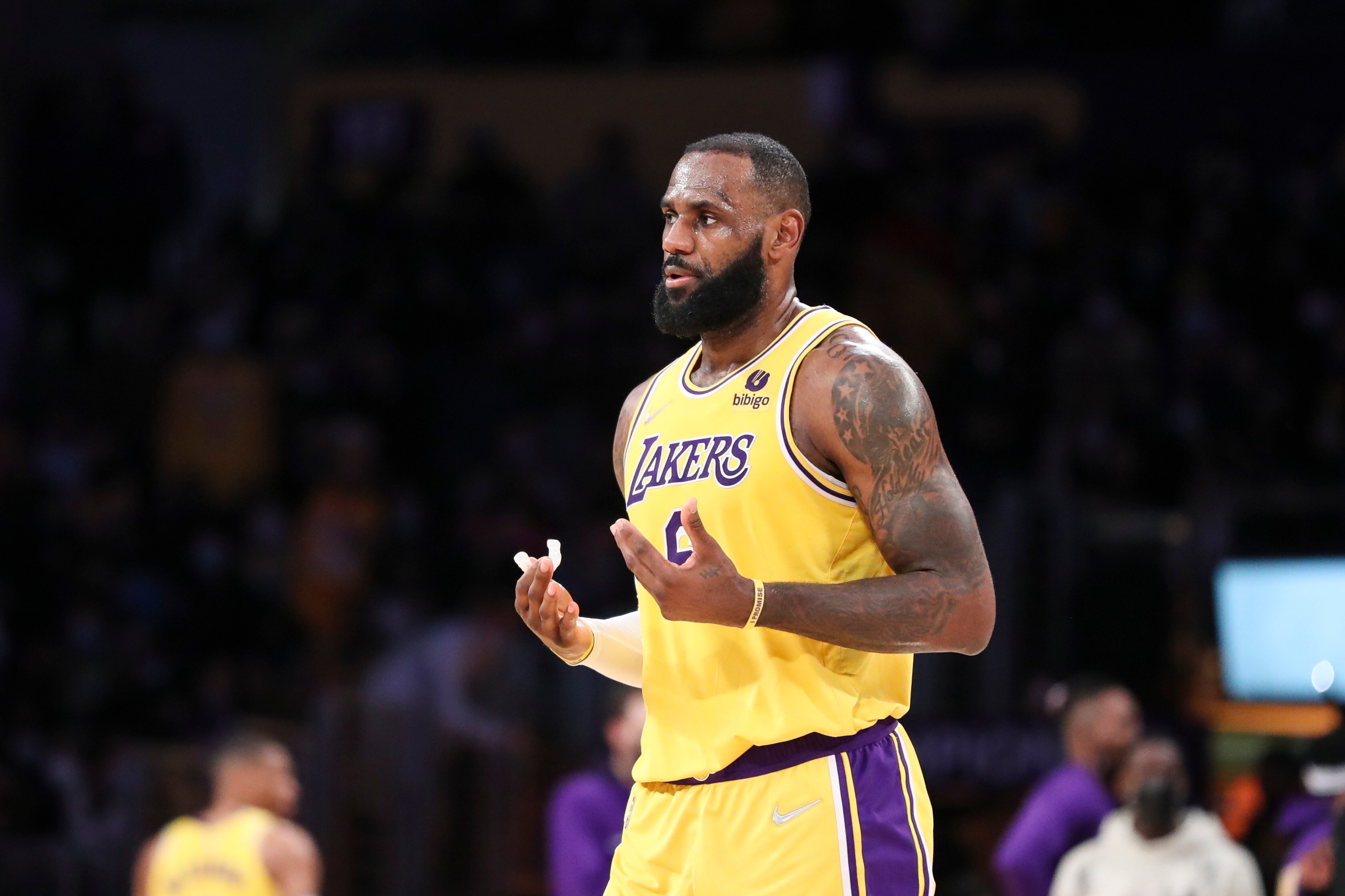 LOS ANGELES, CALIFORNIA - DECEMBER 21: LeBron James #6 of the Los Angeles Lakers reacts during the game against the Phoenix Suns at Staples Center on December 21, 2021 in Los Angeles, California. NOTE TO USER: User expressly acknowledges and agrees that, by downloading and/or using this photograph, User is consenting to the terms and conditions of the Getty Images License Agreement. (Photo by Meg Oliphant/Getty Images )