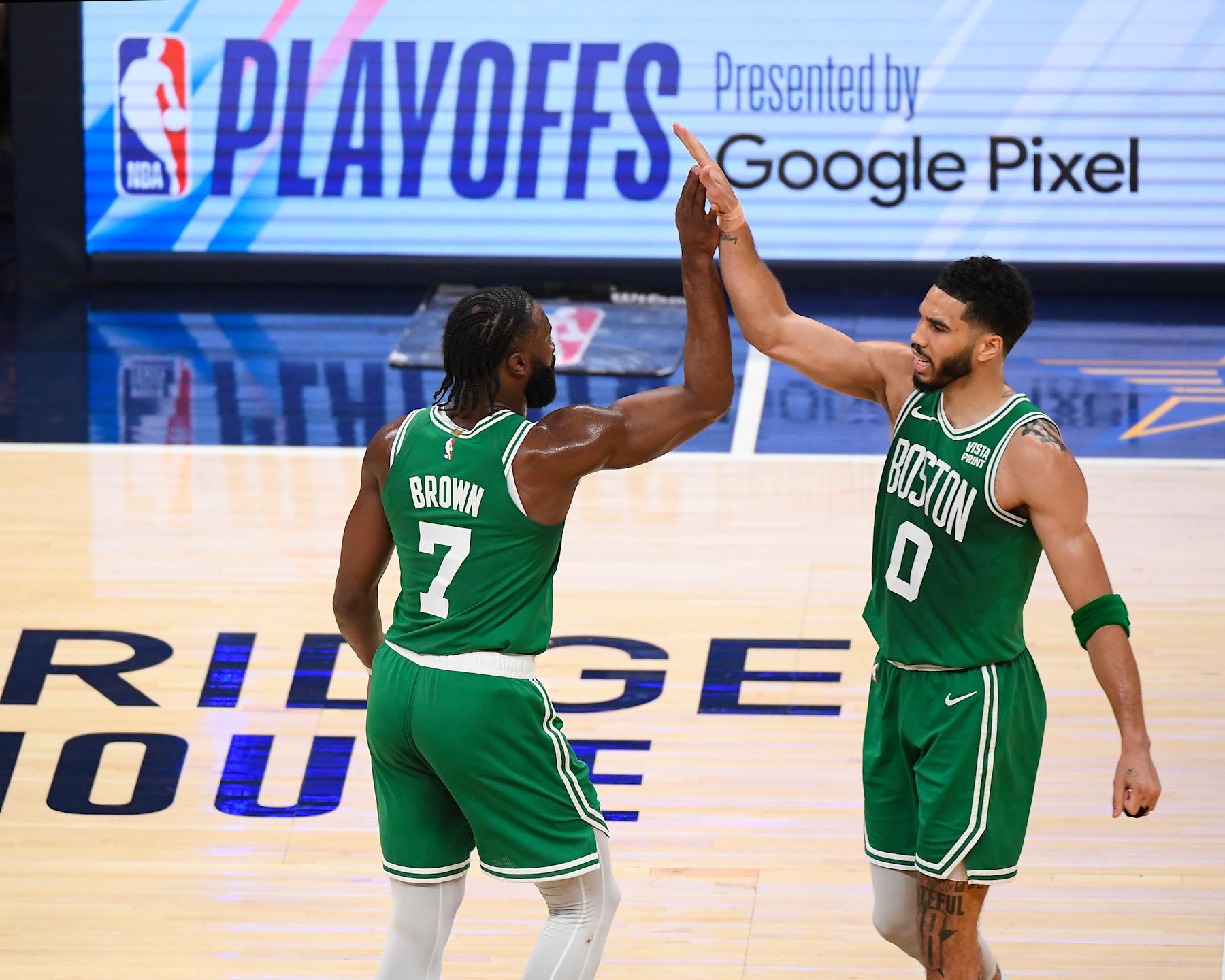 INDIANAPOLIS, IN - MAY 27:  Jaylen Brown #7 of the Boston Celtics and Jayson Tatum #0 of the Boston Celtics high five during the game  against the Indiana Pacers during Game 4 of the Eastern Conference Finals of the 2024 NBA Playoffs on May 27, 2024 at Gainbridge Fieldhouse in Indianapolis, Indiana. NOTE TO USER: User expressly acknowledges and agrees that, by downloading and or using this Photograph, user is consenting to the terms and conditions of the Getty Images License Agreement. Mandatory Copyright Notice: Copyright 2024 NBAE (Photo by Brian Babineau/NBAE via Getty Images)