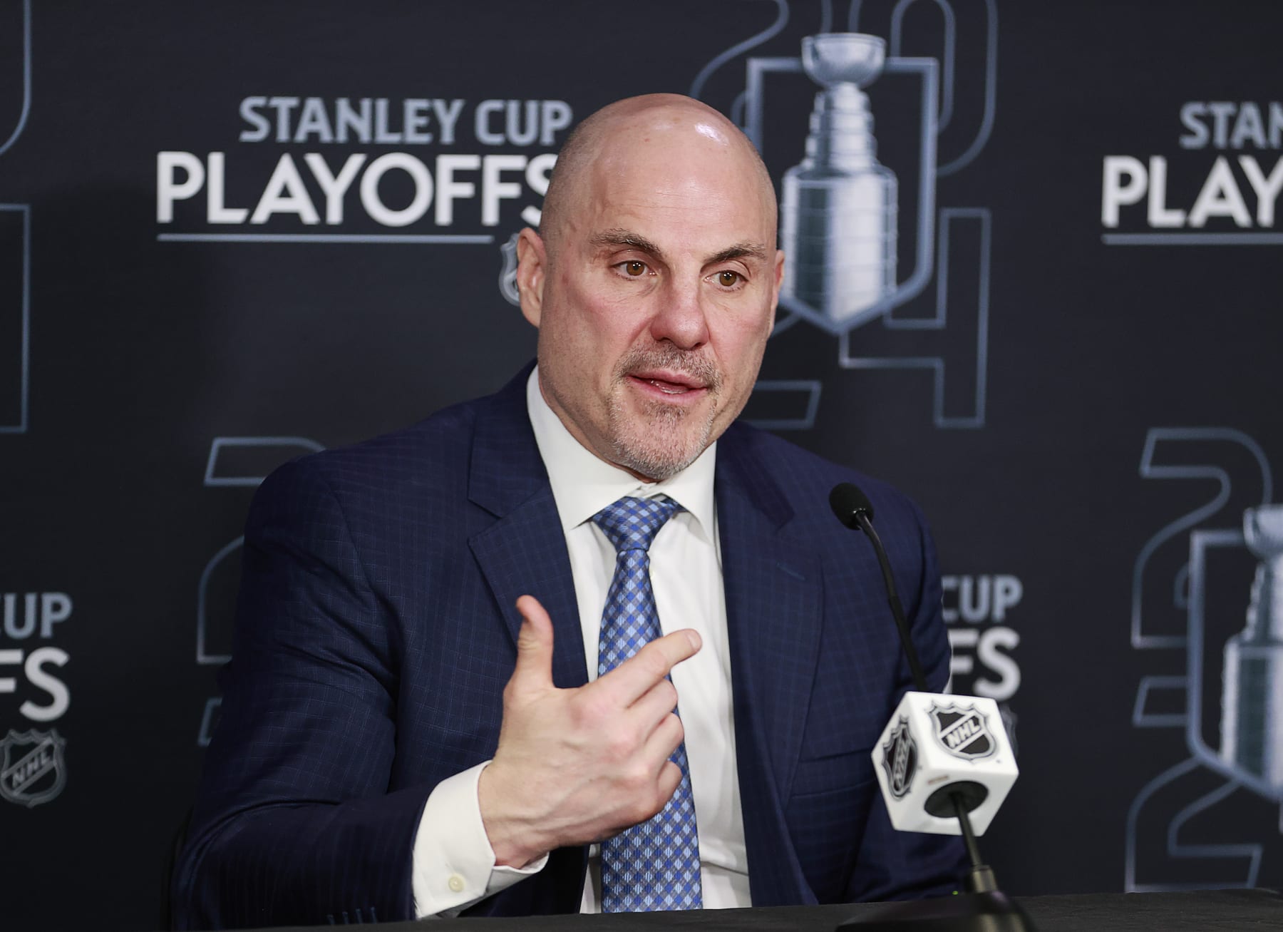 VANCOUVER, CANADA - APRIL 21: Head coach Rick Tocchet of the Vancouver Canucks talks during a press conference after Game One of the First Round of the 2024 Stanley Cup Playoffs against the Nashville Predators at Rogers Arena on April 21, 2024 in Vancouver, British Columbia, Canada. Vancouver won 4-2.  (Photo by Jeff Vinnick/NHLI via Getty Images)