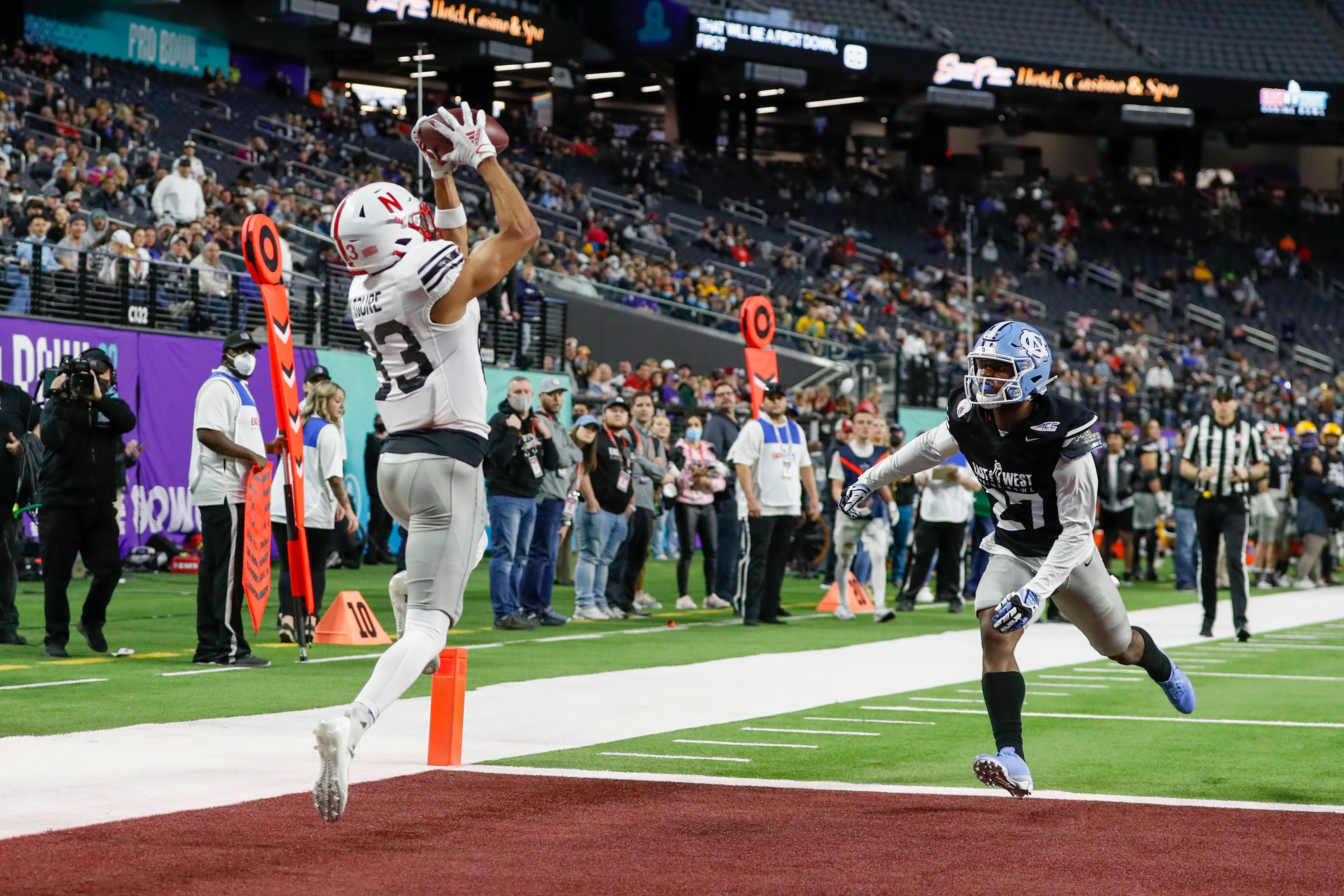LAS VEGAS, NV - FEBRUARY 03: East Team wide receiver Samori Toure (83) of Nebraska catches a touchdown during the East-West Shrine Bowl game on February 03, 2022, at Allegiant Stadium in Las Vegas, NV. (Photo by Jordon Kelly/Icon Sportswire via Getty Images)
