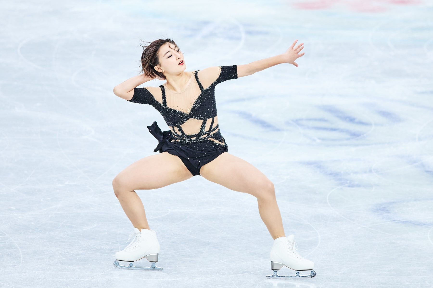 SAITAMA, JAPAN - MARCH 22: Kaori Sakamoto of Japan competes in the Women's Short Program during the ISU World Figure Skating Championships at Saitama Super Arena on March 22, 2023 in Saitama, Japan. (Photo by Joosep Martinson - International Skating Union/International Skating Union via Getty Images)