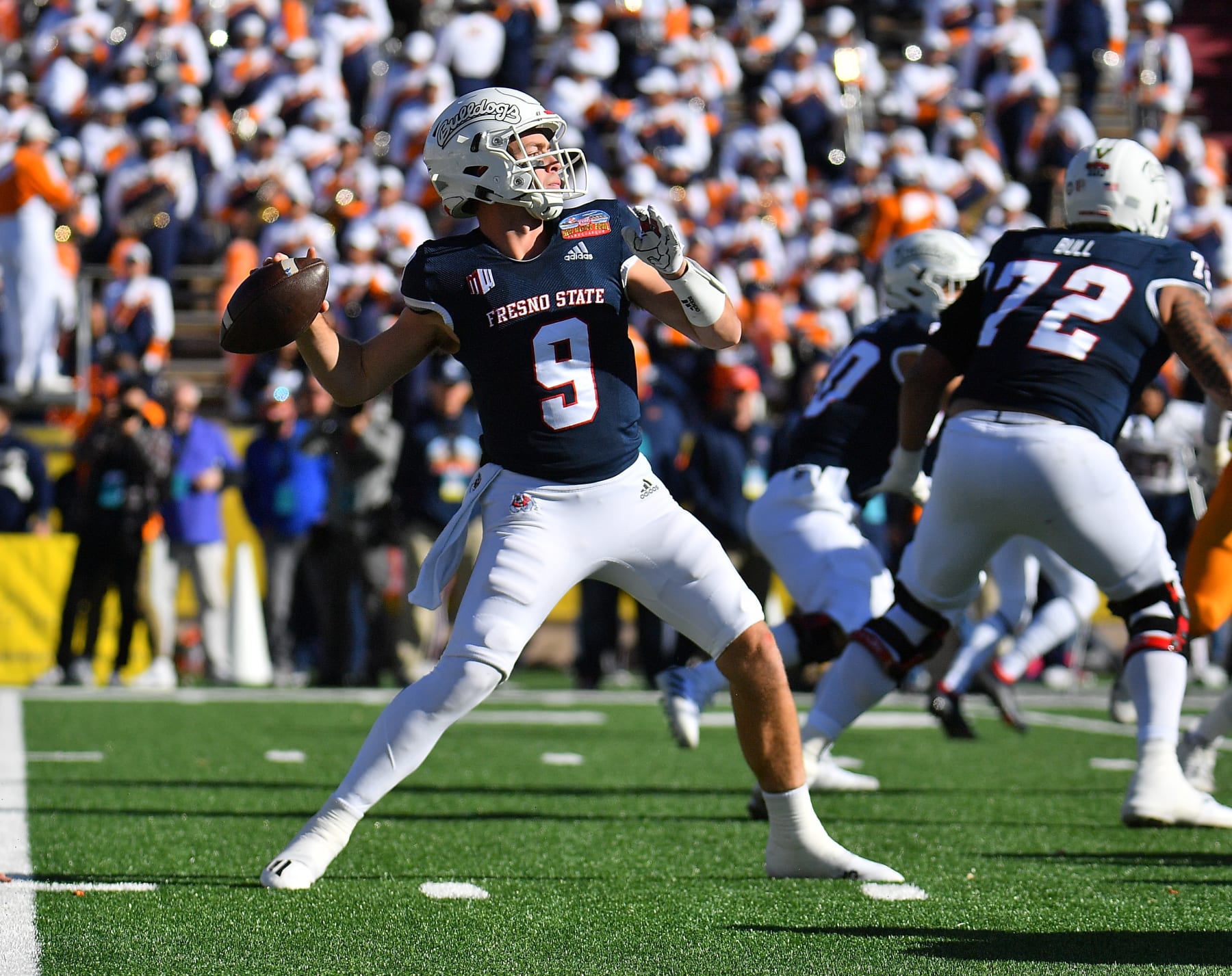 ALBUQUERQUE, NEW MEXICO - DECEMBER 18:  Quarterback Jake Haener #9 of the Fresno State Bulldogs passes against the UTEP Miners during the first half of the PUBG Mobile New Mexico Bowl at University Stadium on December 18, 2021 in Albuquerque, New Mexico.  (Photo by Sam Wasson/Getty Images)