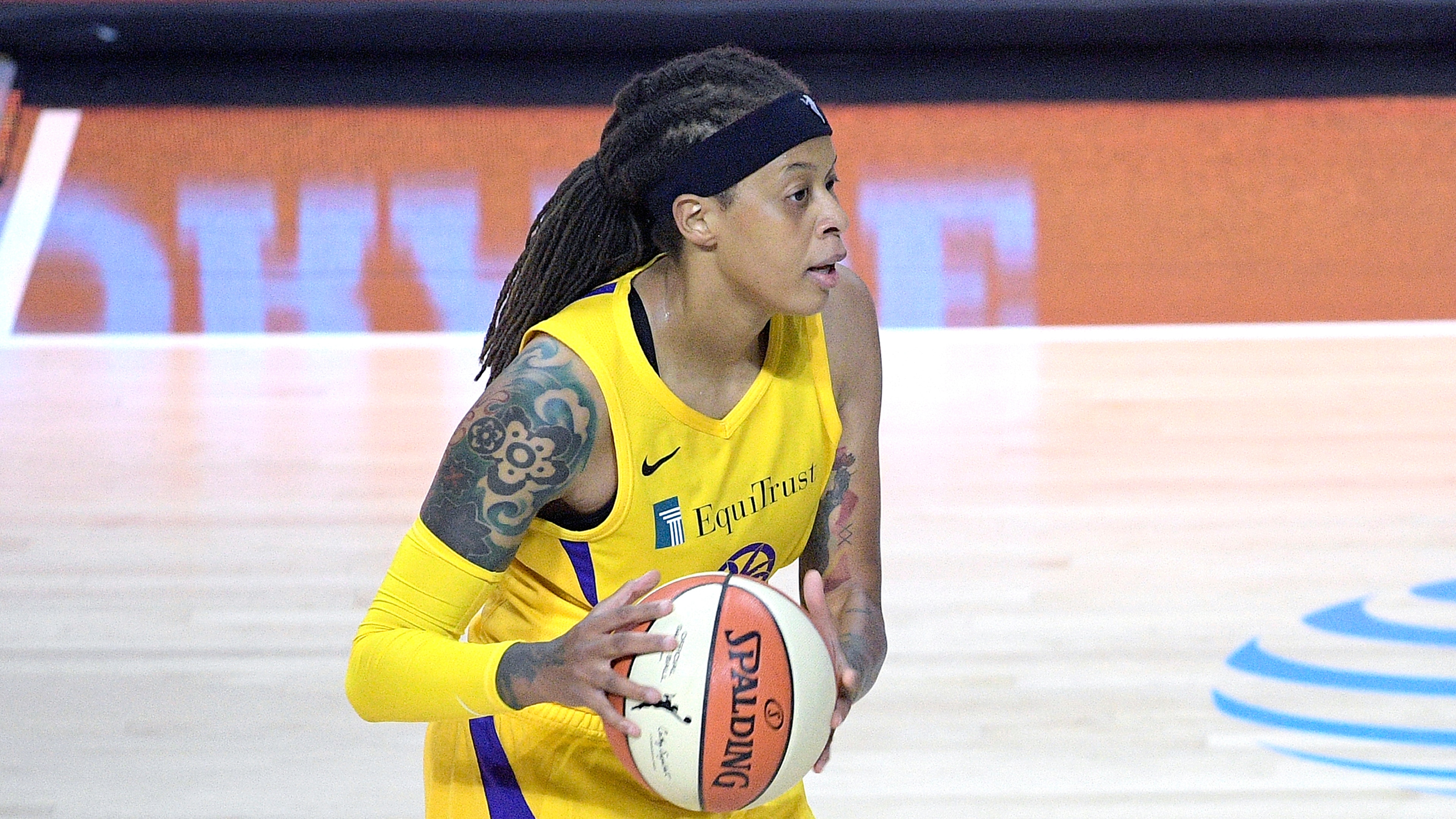 Los Angeles Sparks guard Seimone Augustus (33) sets up a play during the first half of a WNBA basketball game against the Phoenix Mercury, Saturday, July 25, 2020, in Bradenton, Fla. (AP Photo/Phelan M. Ebenhack)