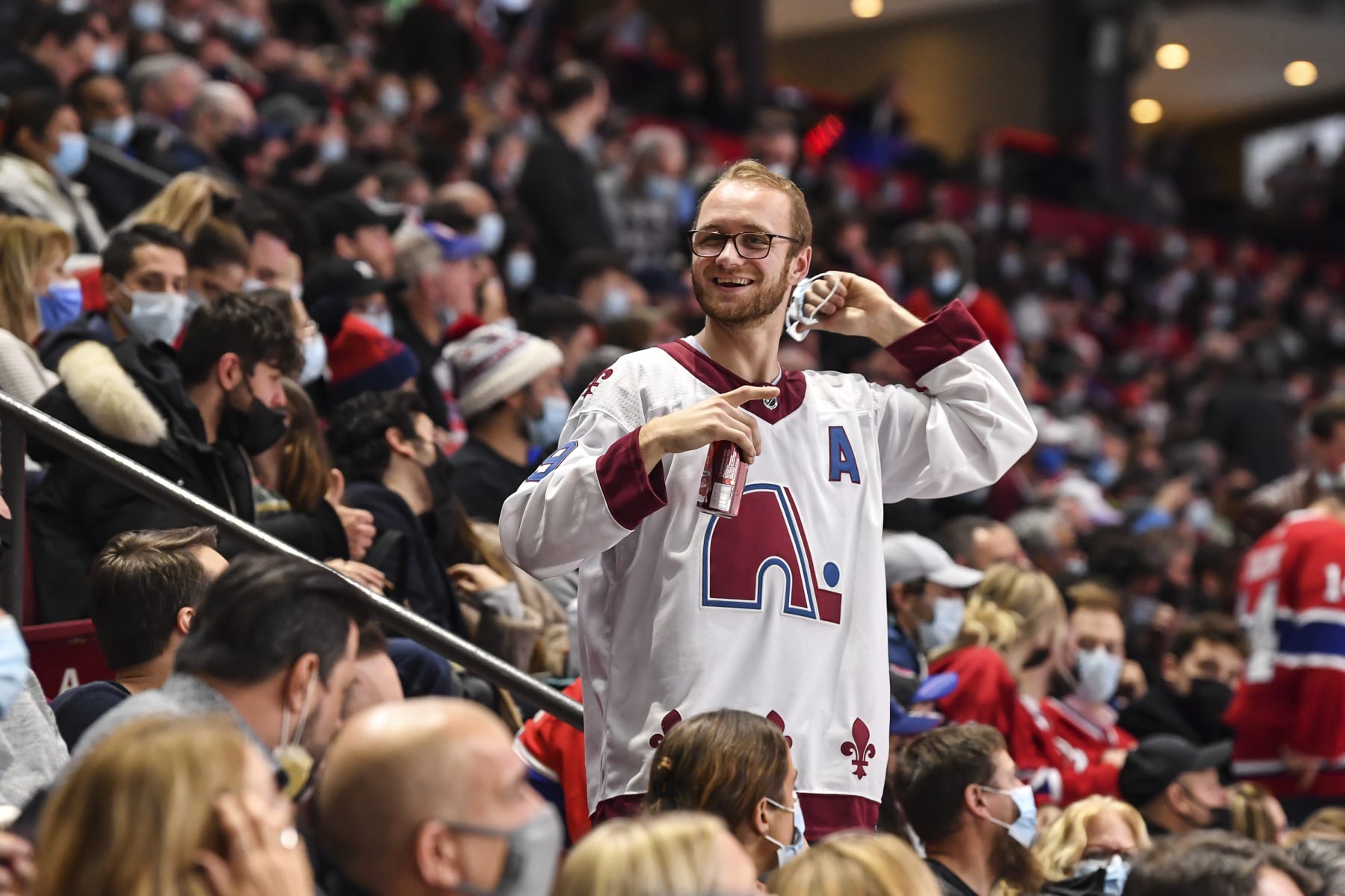 MONTREAL, QC - DECEMBER 02:  A spectator sports a Quebec Nordiques jersey during the third period between the Montreal Canadiens and the Colorado Avalanche at Centre Bell on December 2, 2021 in Montreal, Canada.  The Colorado Avalanche defeated the Montreal Canadiens 4-1.  (Photo by Minas Panagiotakis/Getty Images)
