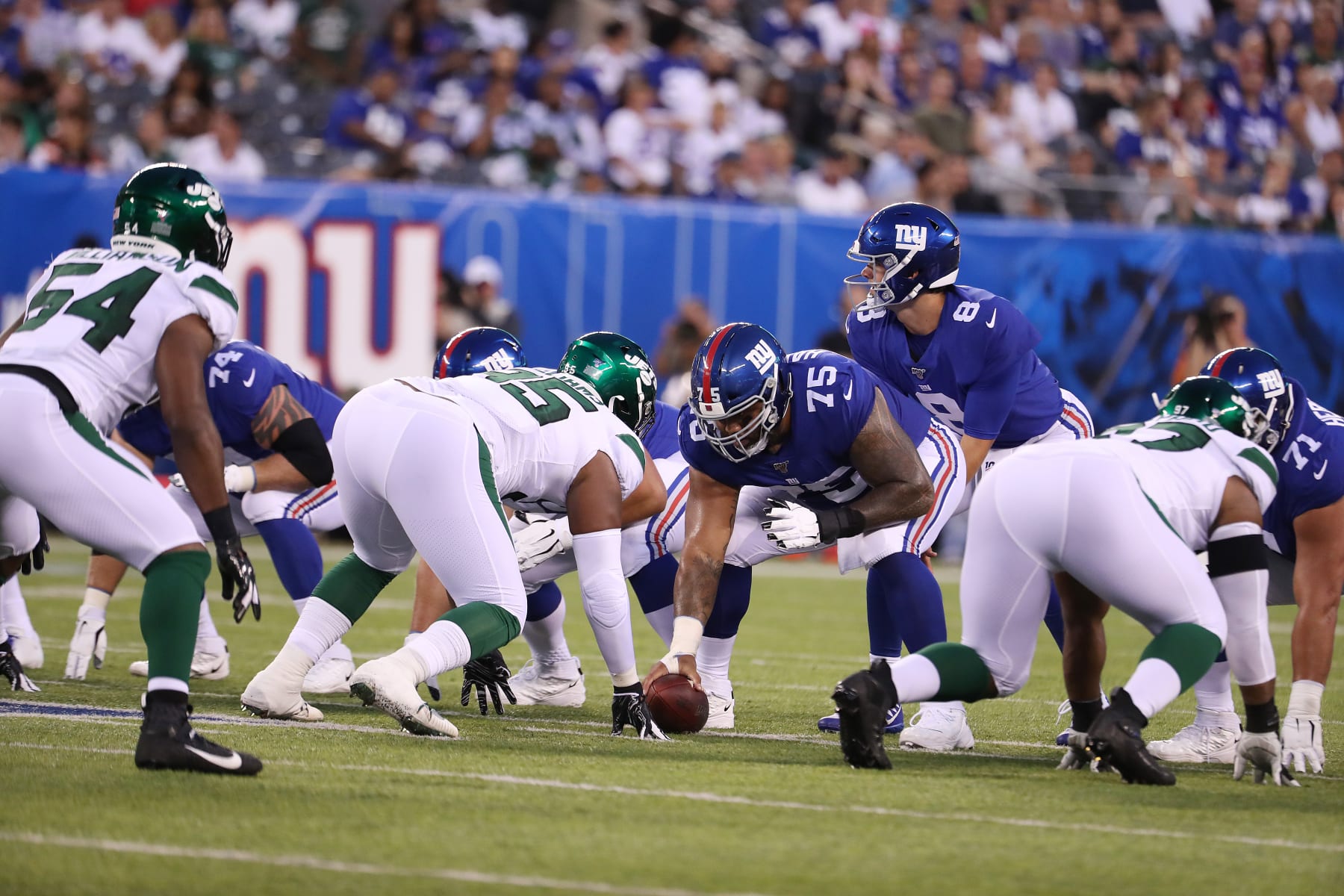 EAST RUTHERFORD, NEW JERSEY - AUGUST 08:  Jon Halapio #75 of the New York Giants in action with Daniel Jones #8 of the New York Giants during their preseason game at MetLife Stadium on August 08, 2019 in East Rutherford, New Jersey. (Photo by Al Bello/Getty Images)