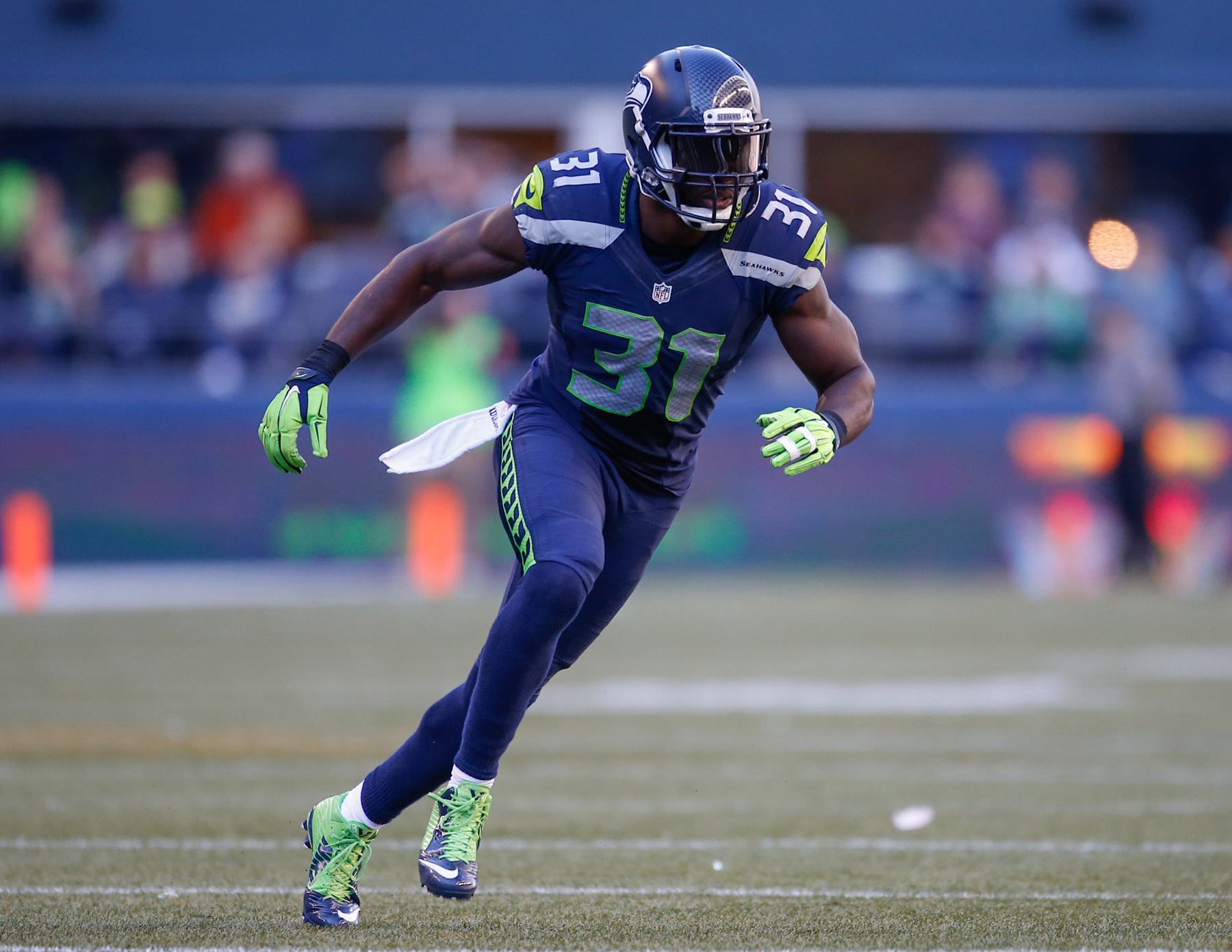 SEATTLE, WA - SEPTEMBER 27:  Strong safety Kam Chancellor #31 of the Seattle Seahawks defends against the Chicago Bears at CenturyLink Field on September 27, 2015 in Seattle, Washington.  (Photo by Otto Greule Jr/Getty Images)