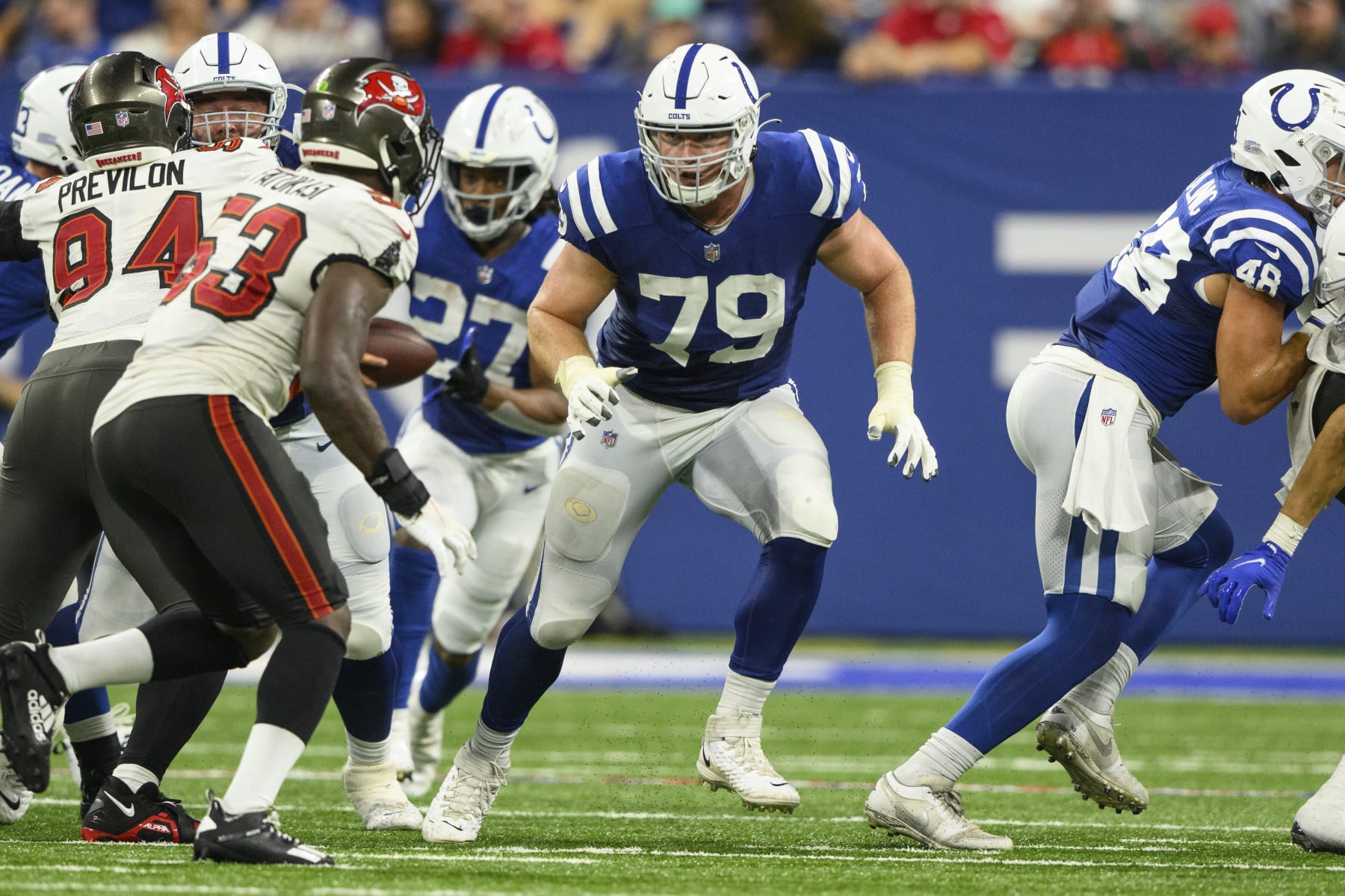 Indianapolis Colts tackle Bernhard Raimann (79) sprints down the field for a block during an NFL football game against the Tampa Bay Buccaneers, Saturday, Aug. 27, 2022, in Indianapolis. (AP Photo/Zach Bolinger)