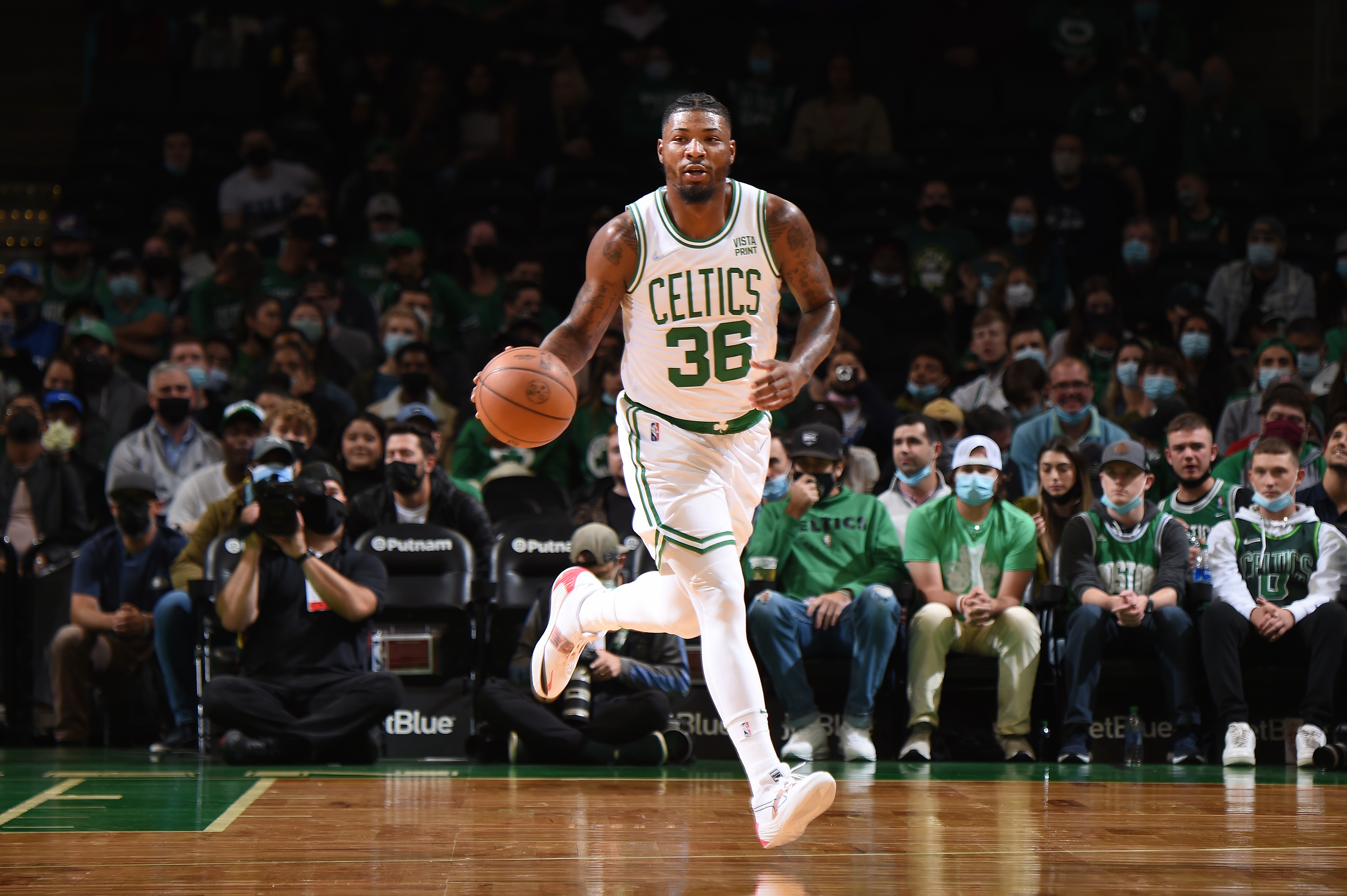 BOSTON, MA - OCTOBER 4: Marcus Smart #36 of the Boston Celtics dribbles the ball during the game against the Orlando Magic on October 4, 2021 at the TD Garden in Boston, Massachusetts.  NOTE TO USER: User expressly acknowledges and agrees that, by downloading and or using this photograph, User is consenting to the terms and conditions of the Getty Images License Agreement. Mandatory Copyright Notice: Copyright 2021 NBAE  (Photo by Brian Babineau/NBAE via Getty Images)