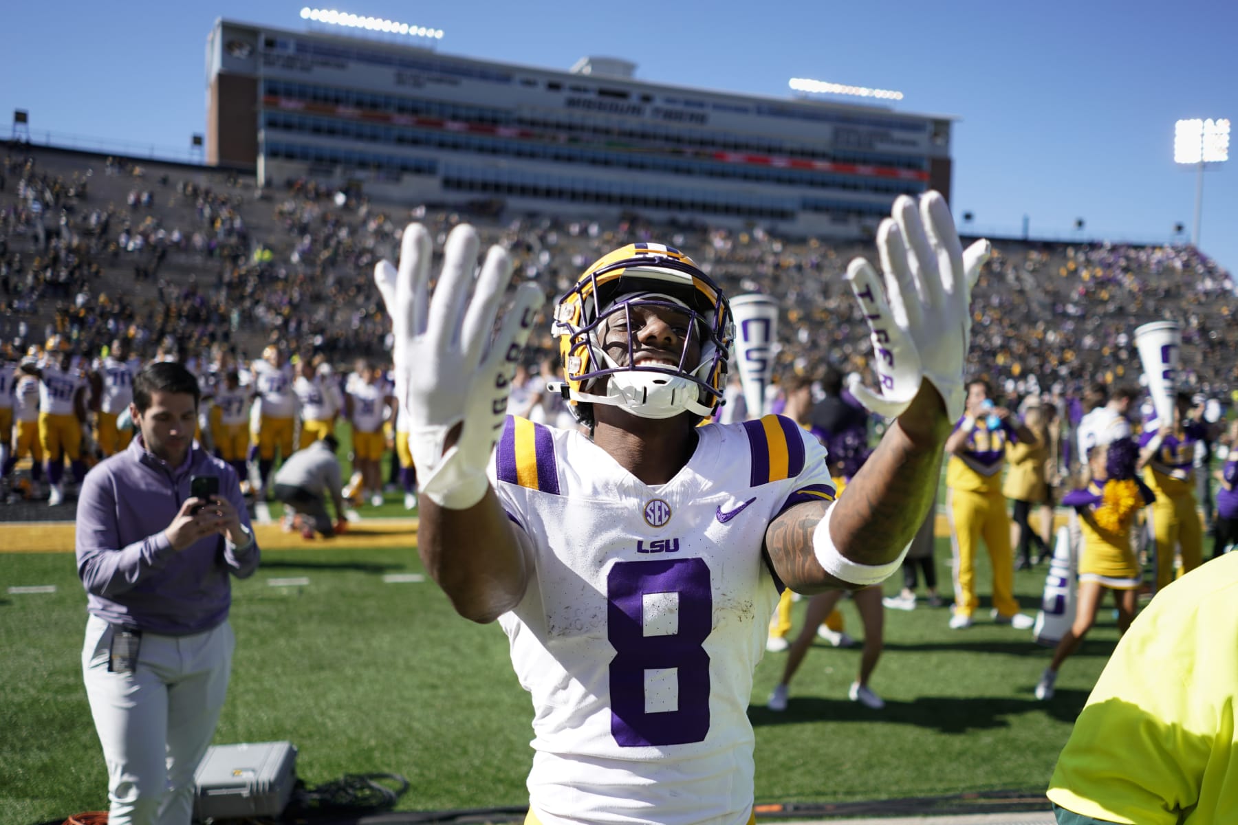 COLUMBIA, MISSOURI - OCTOBER 07: Wide receiver Malik Nabers #8 of the LSU Tigers celebrates a 49-39 win over the Missouri Tigers at Faurot Field/Memorial Stadium on October 07, 2023 in Columbia, Missouri. (Photo by Ed Zurga/Getty Images)