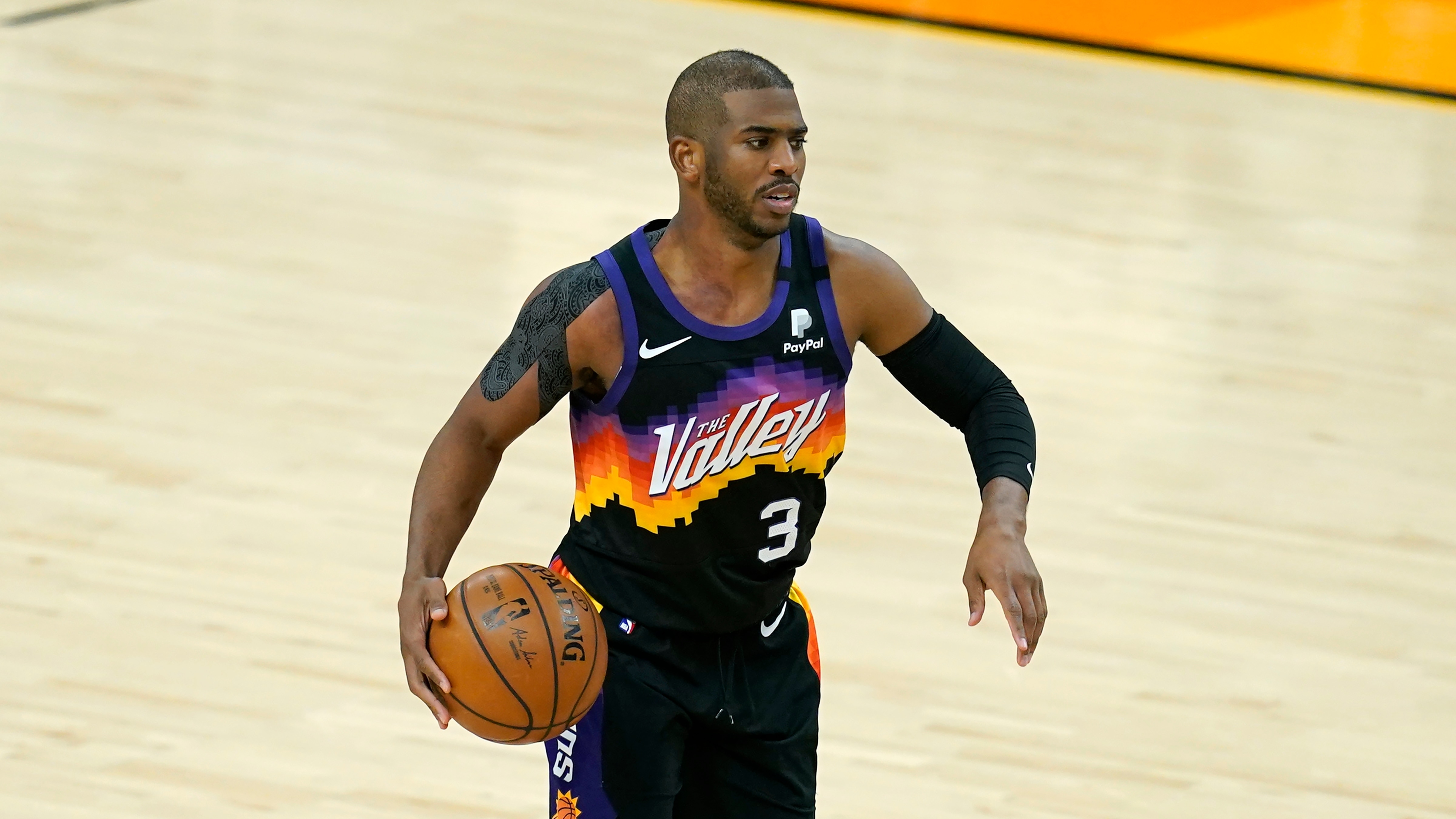 Phoenix Suns guard Chris Paul dribbles the ball against the Los Angeles Lakers during the second half of Game 2 of their NBA basketball first-round playoff series Tuesday, May 25, 2021, in Phoenix. (AP Photo/Ross D. Franklin)