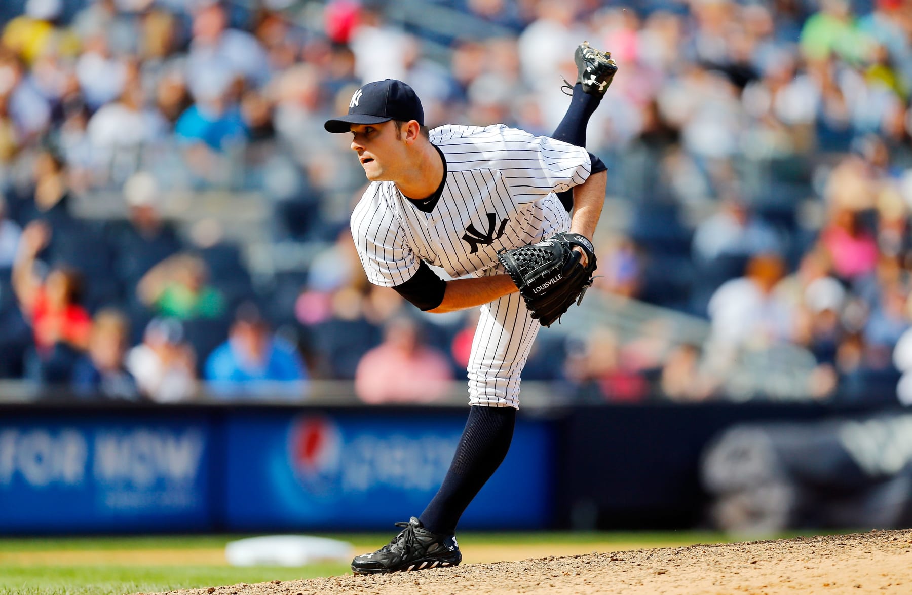 NEW YORK, NY - AUGUST 23:  David Robertson #30 of the New York Yankees in action against the Chicago White Sox at Yankee Stadium on August 23, 2014 in the Bronx borough of New York City. The Yankees defeated the White Sox 5-3.  (Photo by Jim McIsaac/Getty Images) 