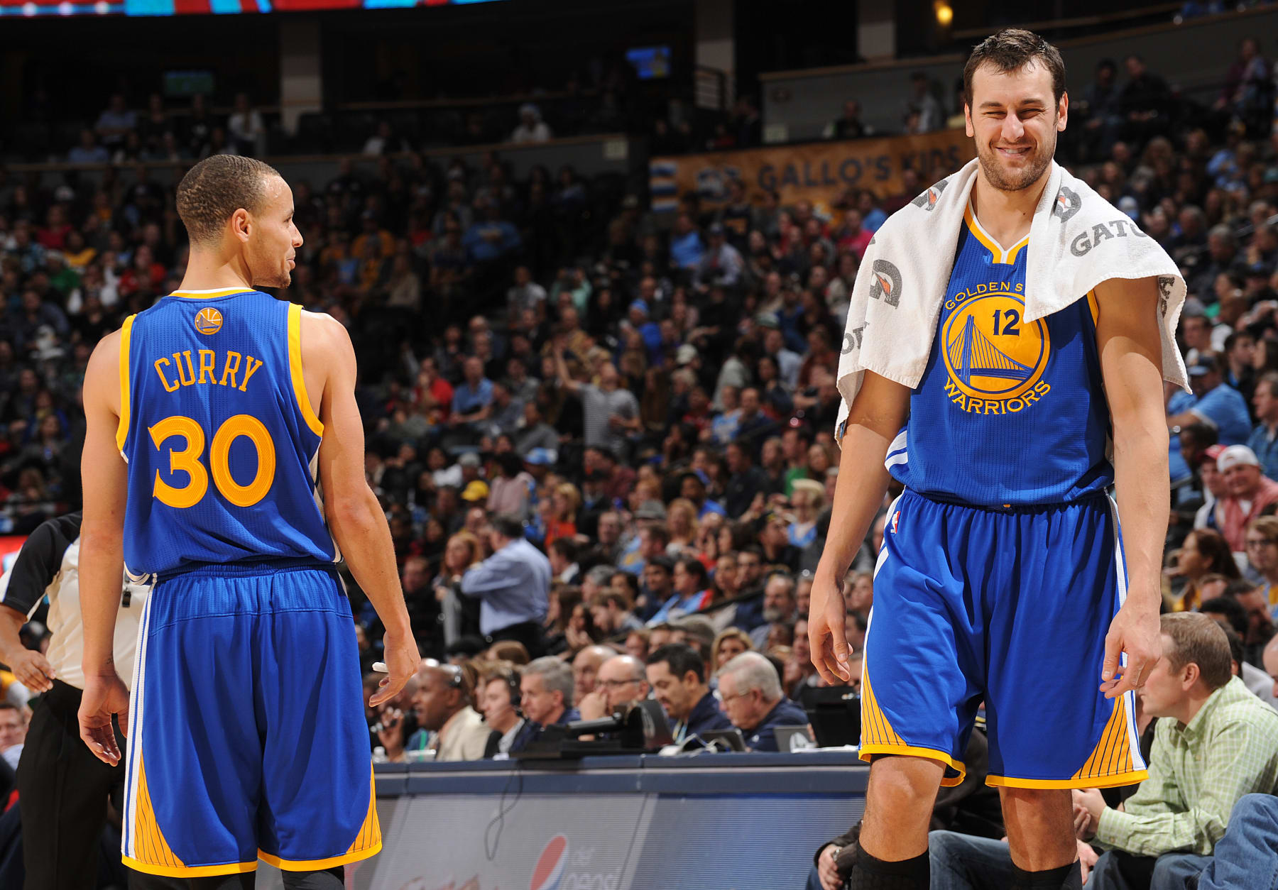 DENVER, CO - December 23: Stephen Curry #30 and Andrew Bogut #12 of the Golden State Warriors share a laugh during the game against the Denver Nuggets on December 23, 2013 at the Pepsi Center in Denver, Colorado. NOTE TO USER: User expressly acknowledges and agrees that, by downloading and/or using this Photograph, user is consenting to the terms and conditions of the Getty Images License Agreement. Mandatory Copyright Notice: Copyright 2013 NBAE (Photo by Bart Young/NBAE via Getty Images)