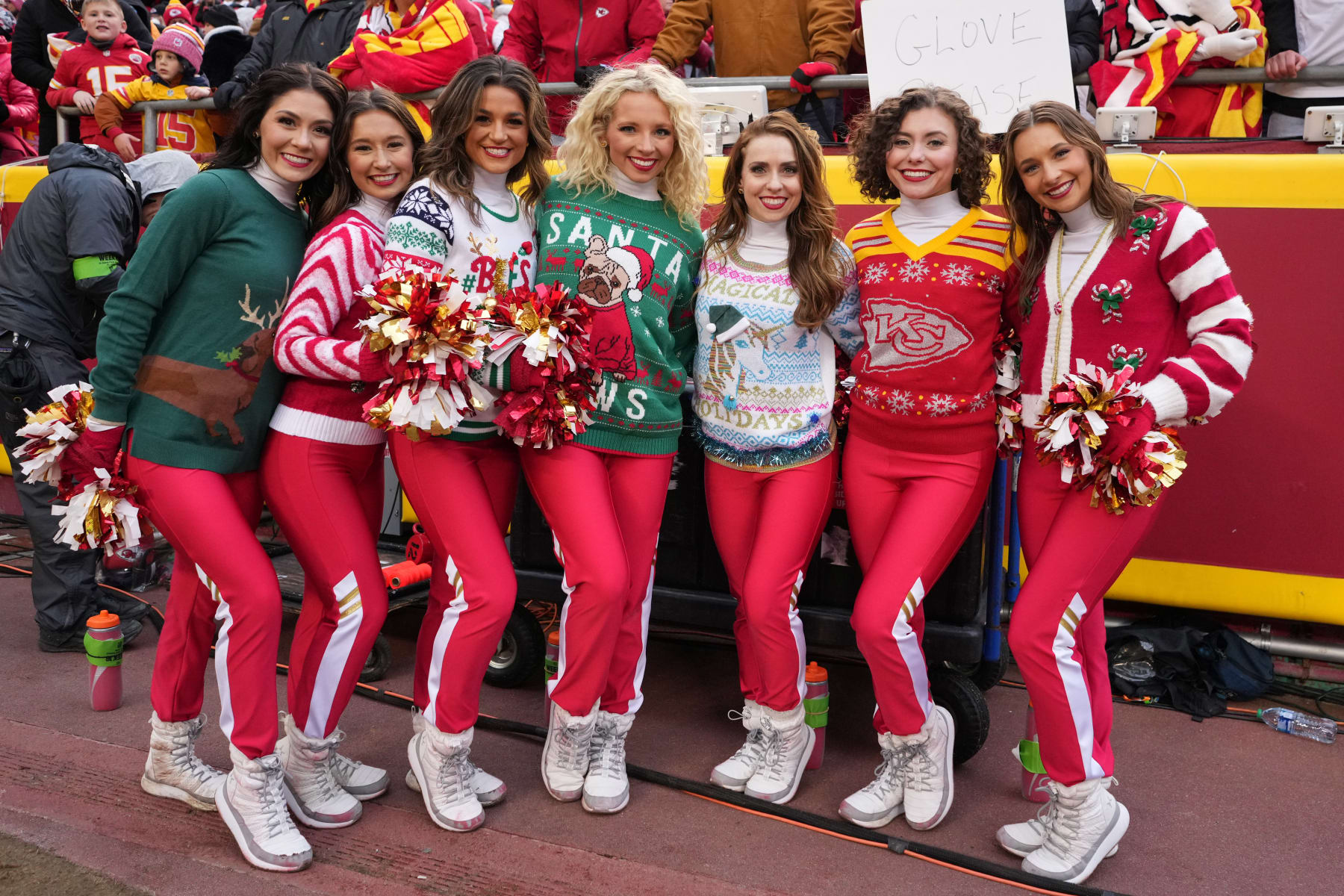KANSAS CITY, MISSOURI - DECEMBER 25: Kansas City Chiefs cheerleaders pose in Christmas sweaters during an NFL football game against the Las Vegas Raiders on December 25, 2023 in Kansas City, Missouri..  (Photo by Kirby Lee/Getty Images)