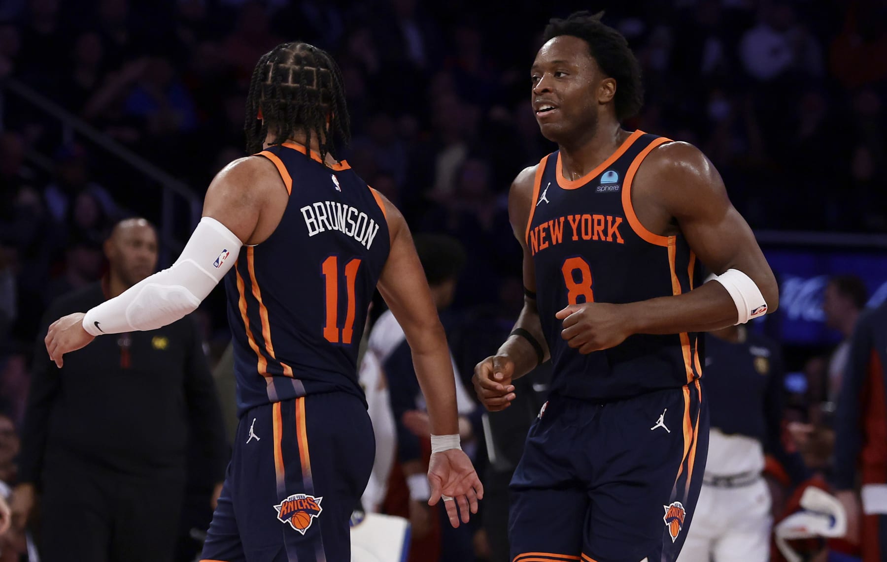 NEW YORK, NEW YORK - JANUARY 25: (NEW YORK DAILIES OUT)  OG Anunoby #8 and Jalen Brunson #11 of the New York Knicks in action against the Denver Nuggets at Madison Square Garden on January 25, 2024 in New York City. The Knicks defeated the Nuggets 122-84.  NOTE TO USER: User expressly acknowledges and agrees that, by downloading and or using this photograph, User is consenting to the terms and conditions of the Getty Images License Agreement. (Photo by Jim McIsaac/Getty Images)