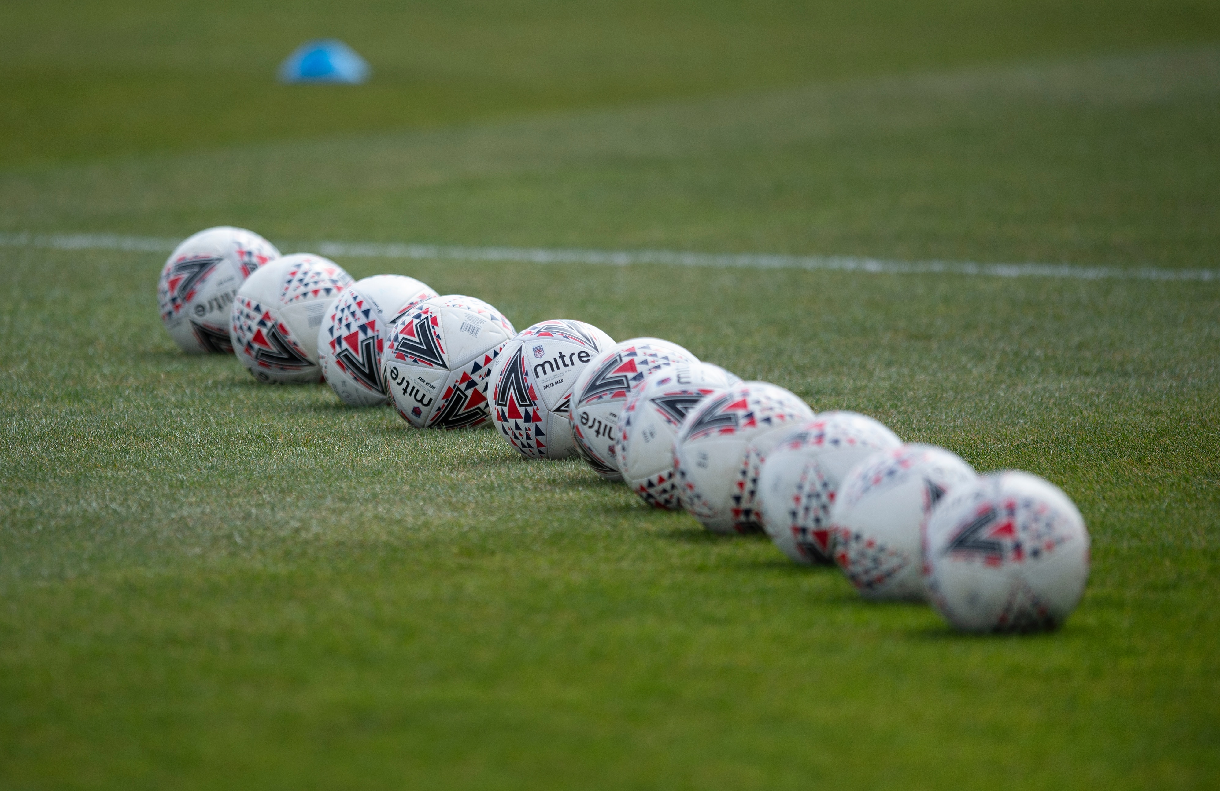 LIVERPOOL, ENGLAND - MAY 02: Barclays FA Women's Super League Mitre match balls lined up before the Barclays FA Women's Super League match between Everton Women and Arsenal Women at Walton Hall Park on May 2, 2021 in Liverpool, England. Sporting stadiums around the UK remain under strict restrictions due to the Coronavirus Pandemic as Government social distancing laws prohibit fans inside venues resulting in games being played behind closed doors. (Photo by Visionhaus/Getty Images)