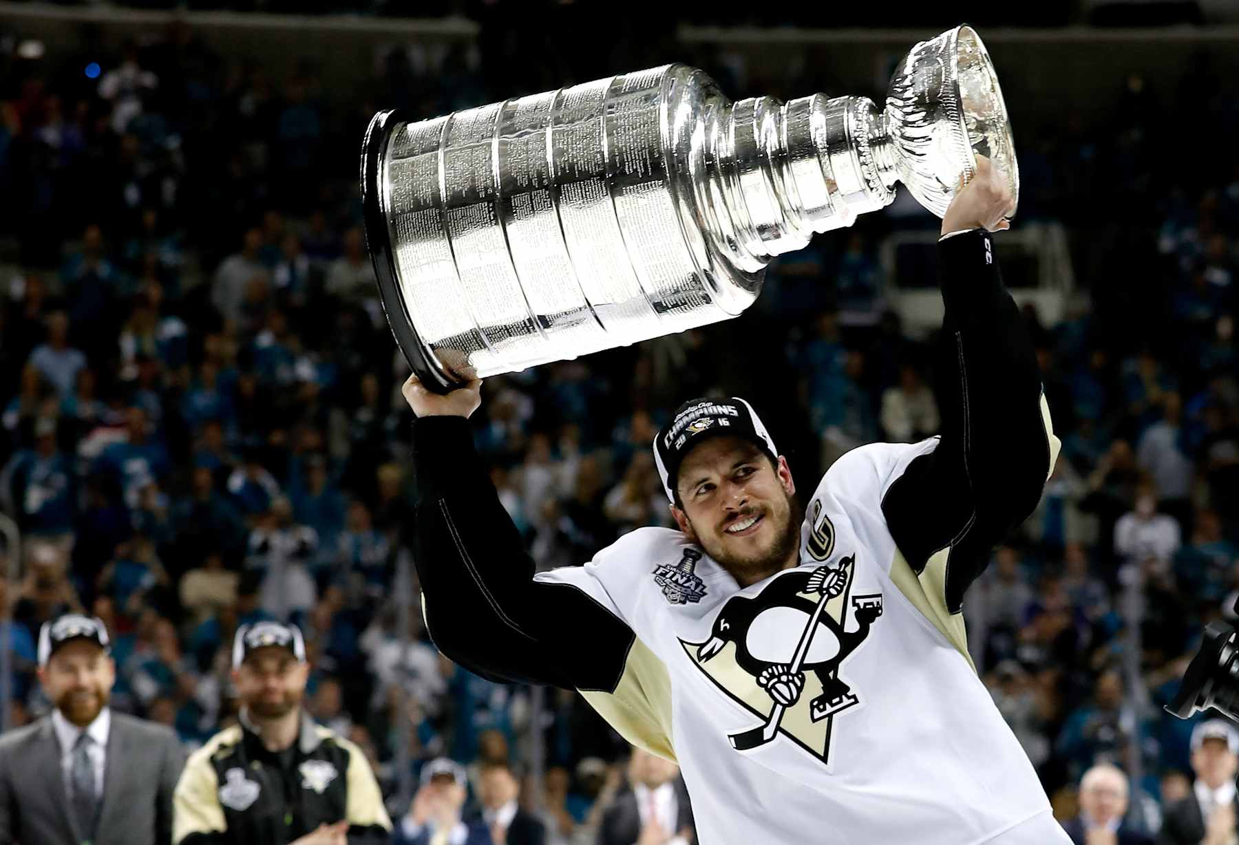 SAN JOSE, CA - JUNE 12:  Sidney Crosby #87 of the Pittsburgh Penguins celebrates by hoisting the Stanley Cup after their 3-1 victory to win the Stanley Cup against the San Jose Sharks in Game Six of the 2016 NHL Stanley Cup Final at SAP Center on June 12, 2016 in San Jose, California.  (Photo by Christian Petersen/Getty Images)