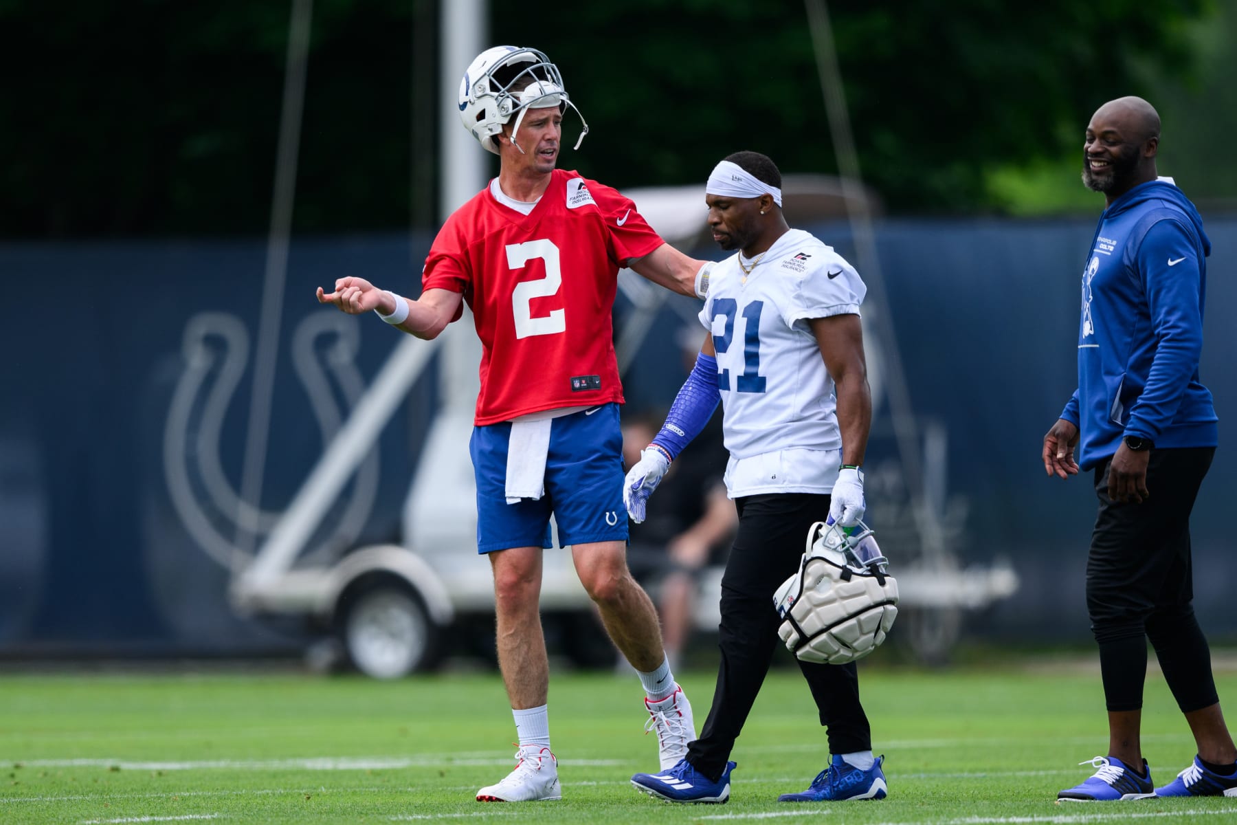 INDIANAPOLIS, IN - JUNE 07: Indianapolis Colts quarterback Matt Ryan (2) talks to Indianapolis Colts running back Nyheim Hines (21) on the field during the Indianapolis Colts OTA offseason workouts on June 7, 2022 at the Indiana Farm Bureau Football Center in Indianapolis, IN. (Photo by Zach Bolinger/Icon Sportswire via Getty Images)