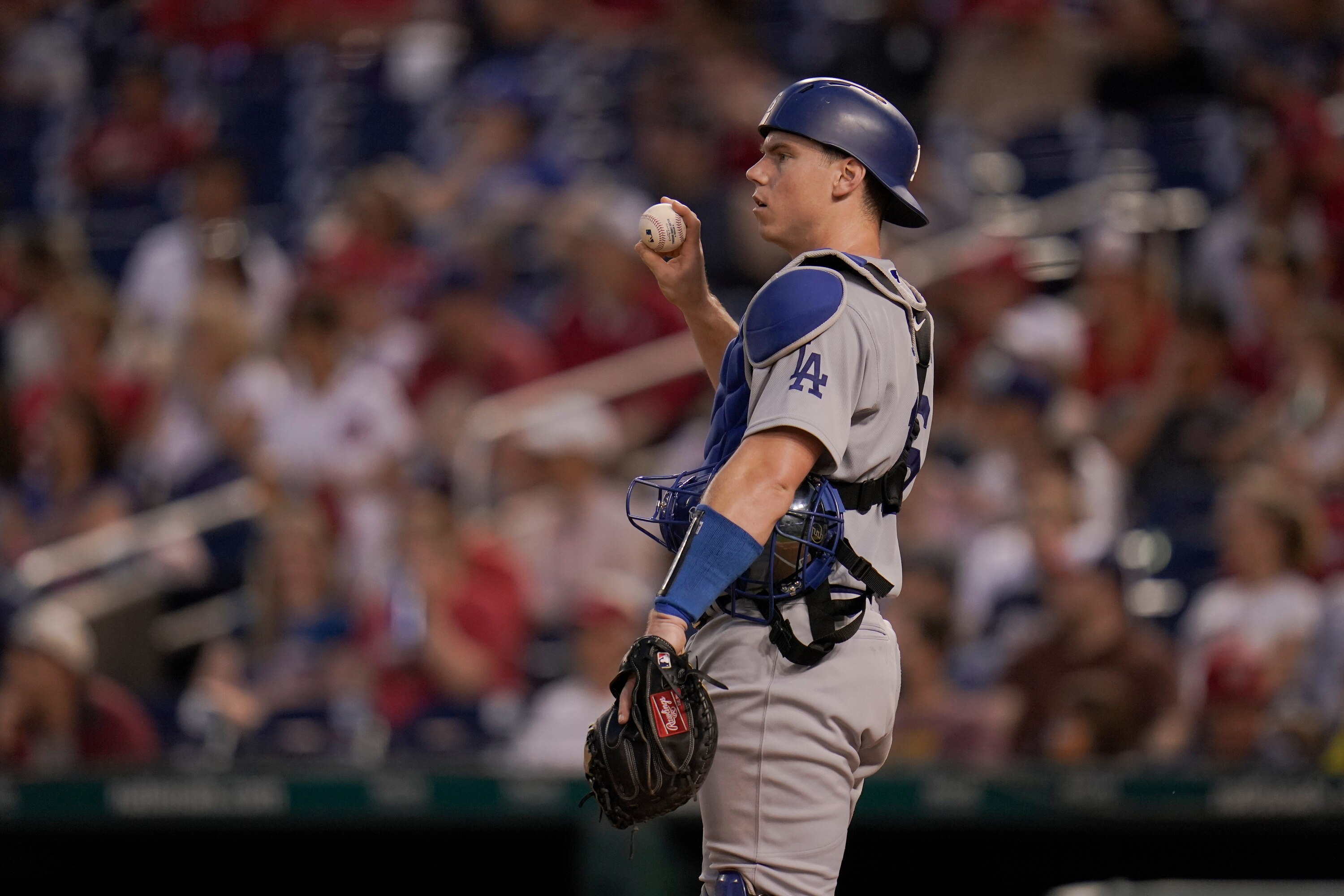 Los Angeles Dodgers catcher Will Smith prepares to toss a ball to starting pitcher Tony Gonsolin during the fourth inning of a baseball game against the Washington Nationals, Thursday, July 1, 2021, in Washington. (AP Photo/Julio Cortez)