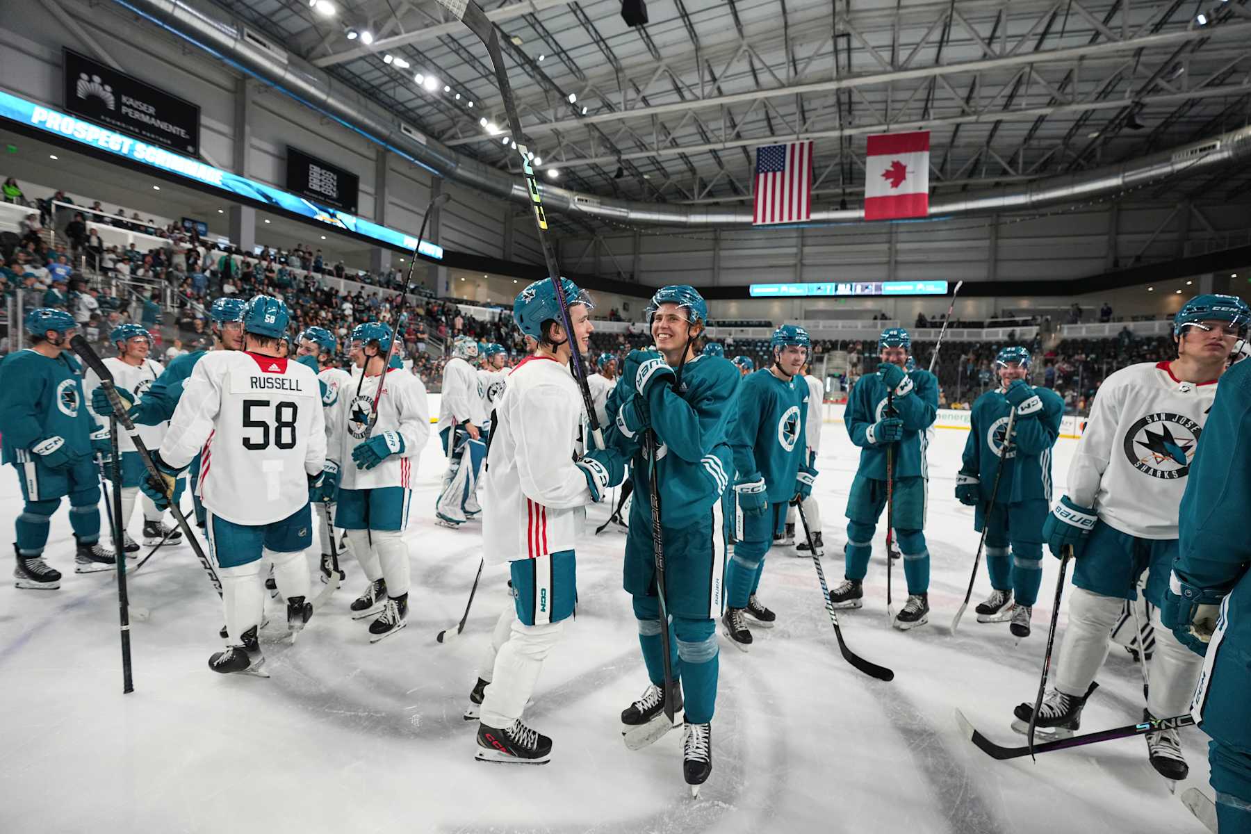 SAN JOSE, CA - JULY 4: Will Smith #2 and Macklin Celebrini #71 of the San Jose Sharks talk on the ice after the San Jose Sharks Prospect Scrimmage at Tech CU Arena on July 4, 2024 in San Jose, California. (Photo by Kavin Mistry/NHLI via Getty Images)