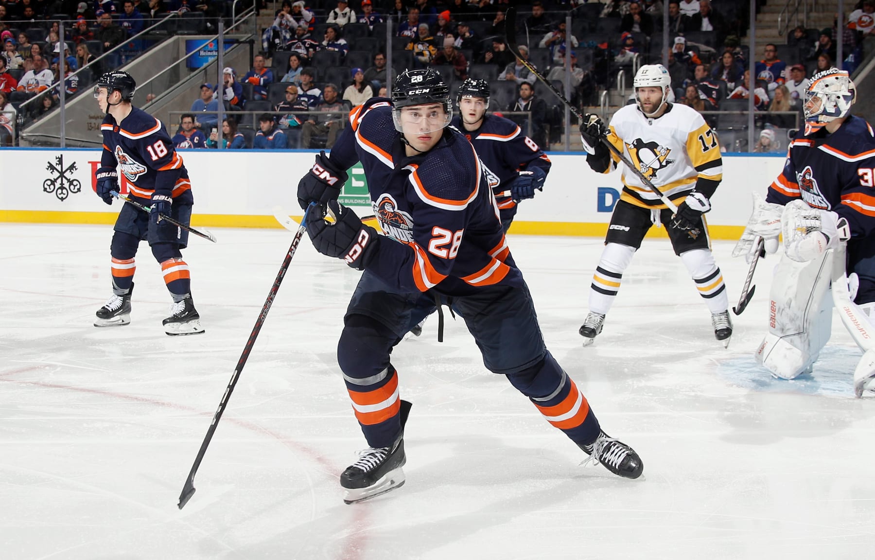 ELMONT, NEW YORK - DECEMBER 27: Alexander Romanov #28 of the New York Islanders skates against the Pittsburgh Penguins at the UBS Arena on December 27, 2022 in Elmont, New York. (Photo by Bruce Bennett/Getty Images)