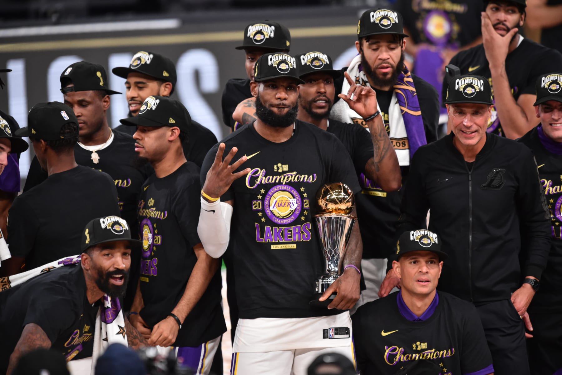 ORLANDO, FL - OCTOBER 11: LeBron James #23 of the Los Angeles Lakers celebrates after receiving the Bill Russell Finals MVP Trophy after Game Six of the NBA Finals on October 11, 2020 at the AdventHealth Arena at ESPN Wide World Of Sports Complex in Orlando, Florida. NOTE TO USER: User expressly acknowledges and agrees that, by downloading and/or using this Photograph, user is consenting to the terms and conditions of the Getty Images License Agreement. Mandatory Copyright Notice: Copyright 2020 NBAE (Photo by David Dow/NBAE via Getty Images)