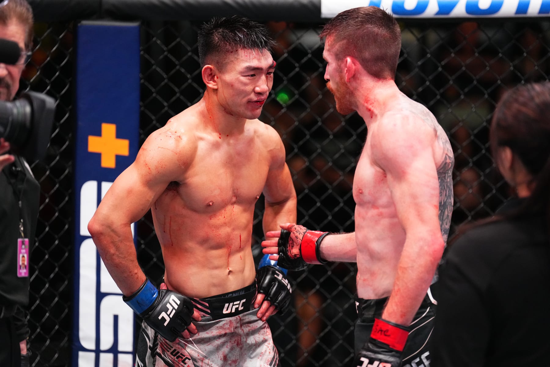 LAS VEGAS, NEVADA - SEPTEMBER 17: (R-L) Cory Sandhagen reacts after the stoppage is called due to injury against Song Yadong of China in a bantamweight fight during the UFC Fight Night event at UFC APEX on September 17, 2022 in Las Vegas, Nevada. (Photo by Chris Unger/Zuffa LLC)