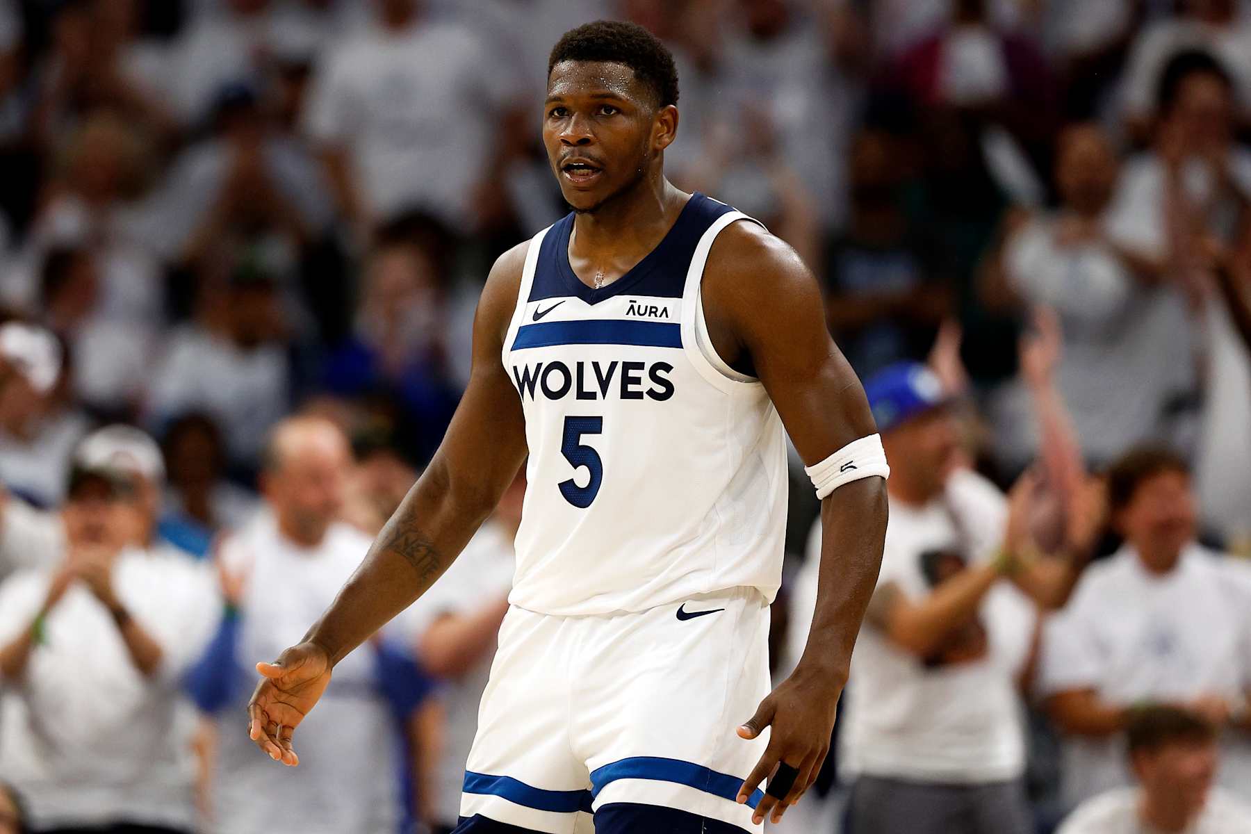 MINNEAPOLIS, MINNESOTA - MAY 12: Anthony Edwards #5 of the Minnesota Timberwolves looks on against the Denver Nuggets in the second quarter of Game Four of the Western Conference Second Round Playoffs at Target Center on May 12, 2024 in Minneapolis, Minnesota. The Nuggets defeated the Timberwolves 115-107. (Photo by David Berding/Getty Images)