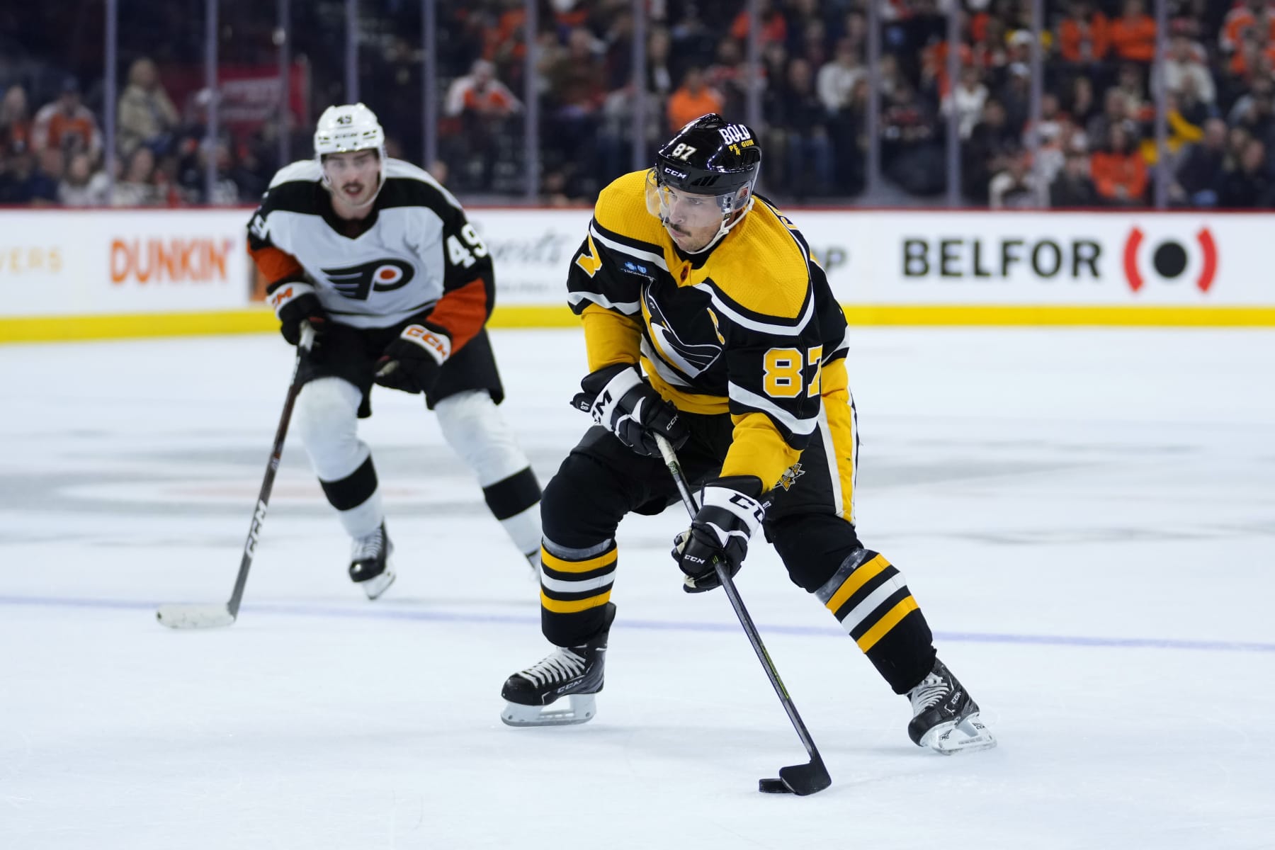 Pittsburgh Penguins' Sidney Crosby skates with the puck during the first period of an NHL hockey game against the Philadelphia Flyers, Friday, Nov. 25, 2022, in Philadelphia. (AP Photo/Matt Slocum)