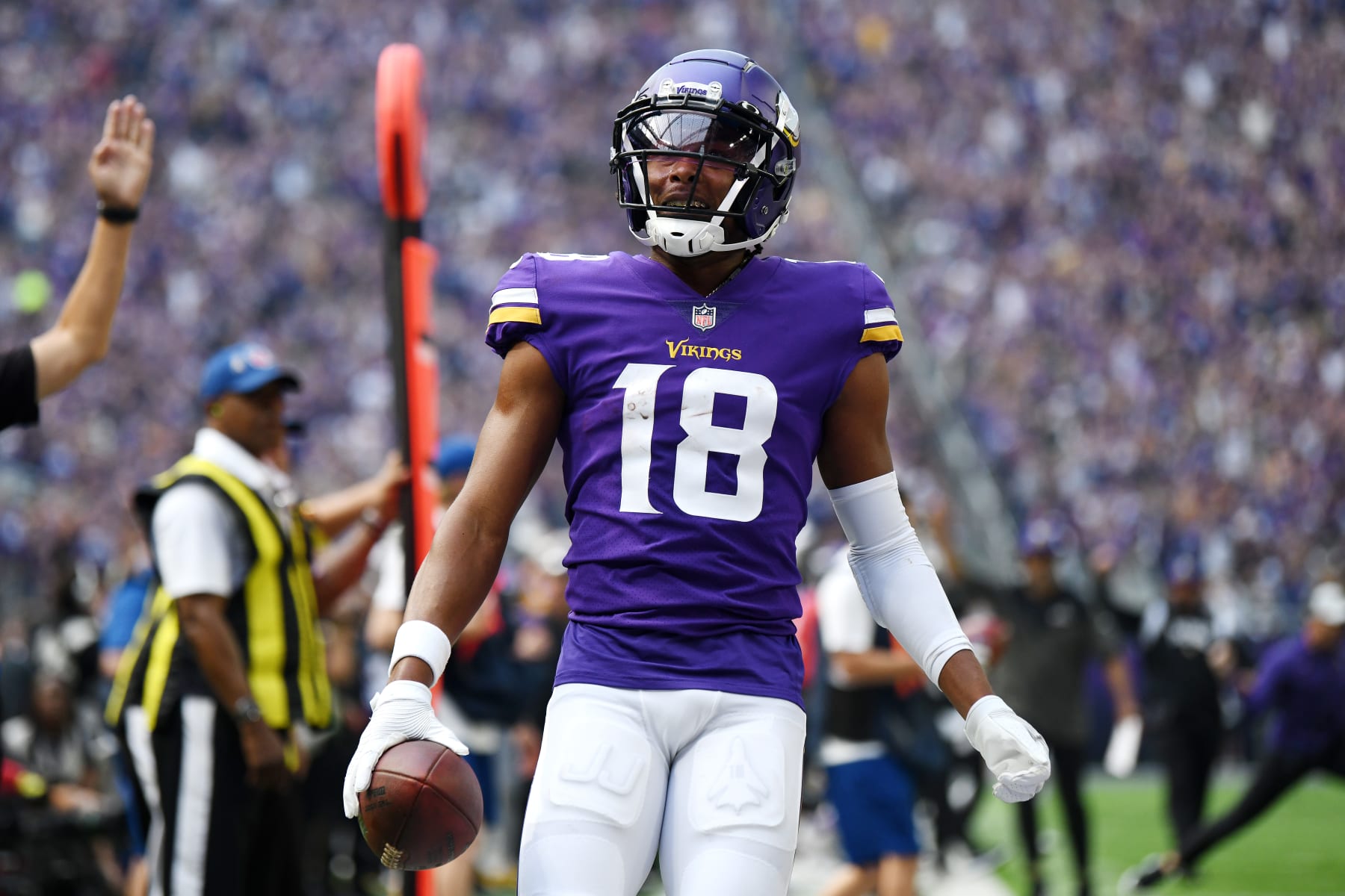 MINNEAPOLIS, MINNESOTA - SEPTEMBER 11: Justin Jefferson #18 of the Minnesota Vikings celebrates after scoring a touchdown during the first quarter in the game against the Green Bay Packers at U.S. Bank Stadium on September 11, 2022 in Minneapolis, Minnesota. (Photo by Stephen Maturen/Getty Images)