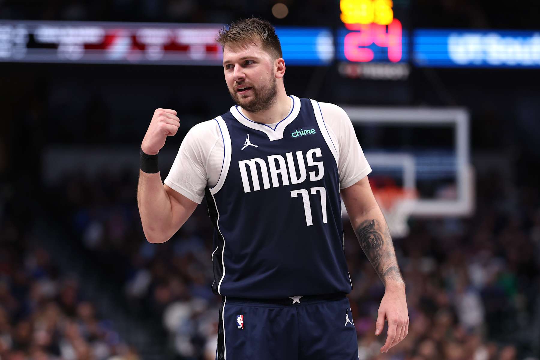 DALLAS, TEXAS - DECEMBER 23: Luka Doncic #77 of the Dallas Mavericks reacts during the second half against the Portland Trail Blazers at American Airlines Center on December 23, 2024 in Dallas, Texas. NOTE TO USER: User expressly acknowledges and agrees that, by downloading and/or using this photograph, user is consenting to the terms and conditions of the Getty Images License Agreement. (Photo by Sam Hodde/Getty Images)
