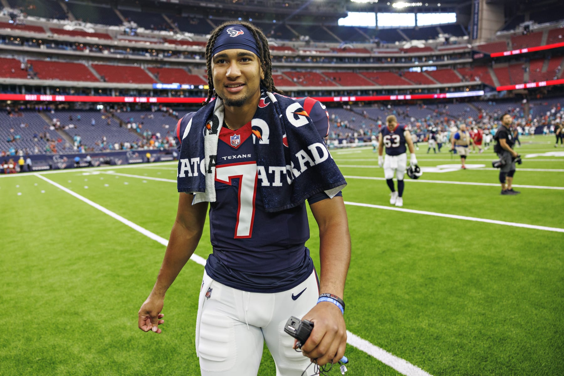 HOUSTON, TEXAS - AUGUST 19: C.J. Stroud #7 of the Houston Texans walks off the field after the preseason game against the Miami Dolphins at NRG Stadium on August 19, 2023 in Houston, Texas. The Dolphins defeated the Texans 28-3.  (Photo by Wesley Hitt/Getty Images)