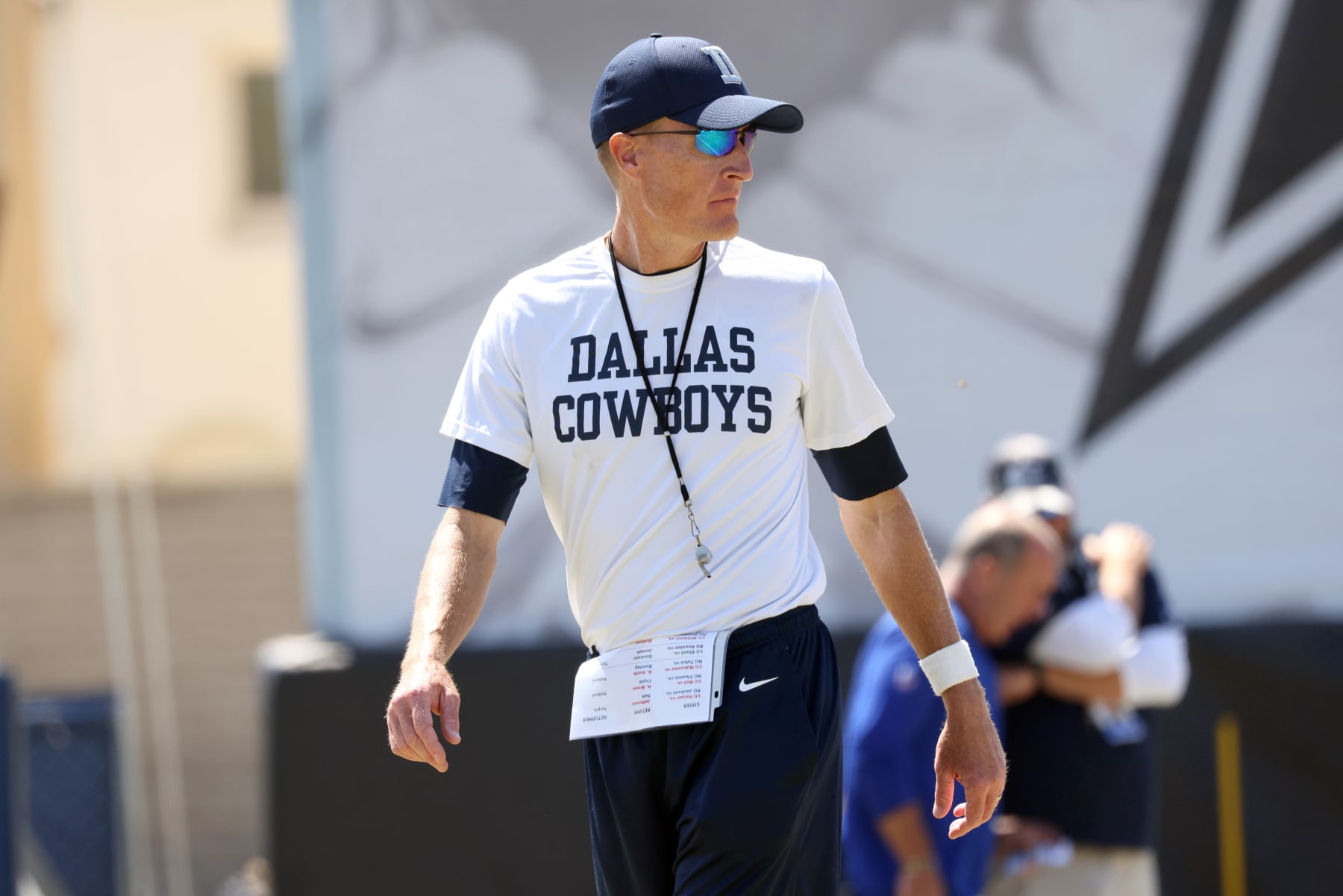 OXNARD, CALIFORNIA - AUGUST 08: Special teams coordinator John Fassel of the Dallas Cowboys is seen on the sidelines during training camp at River Ridge Fields on August 08, 2022 in Oxnard, California. (Photo by Josh Lefkowitz/Getty Images)
