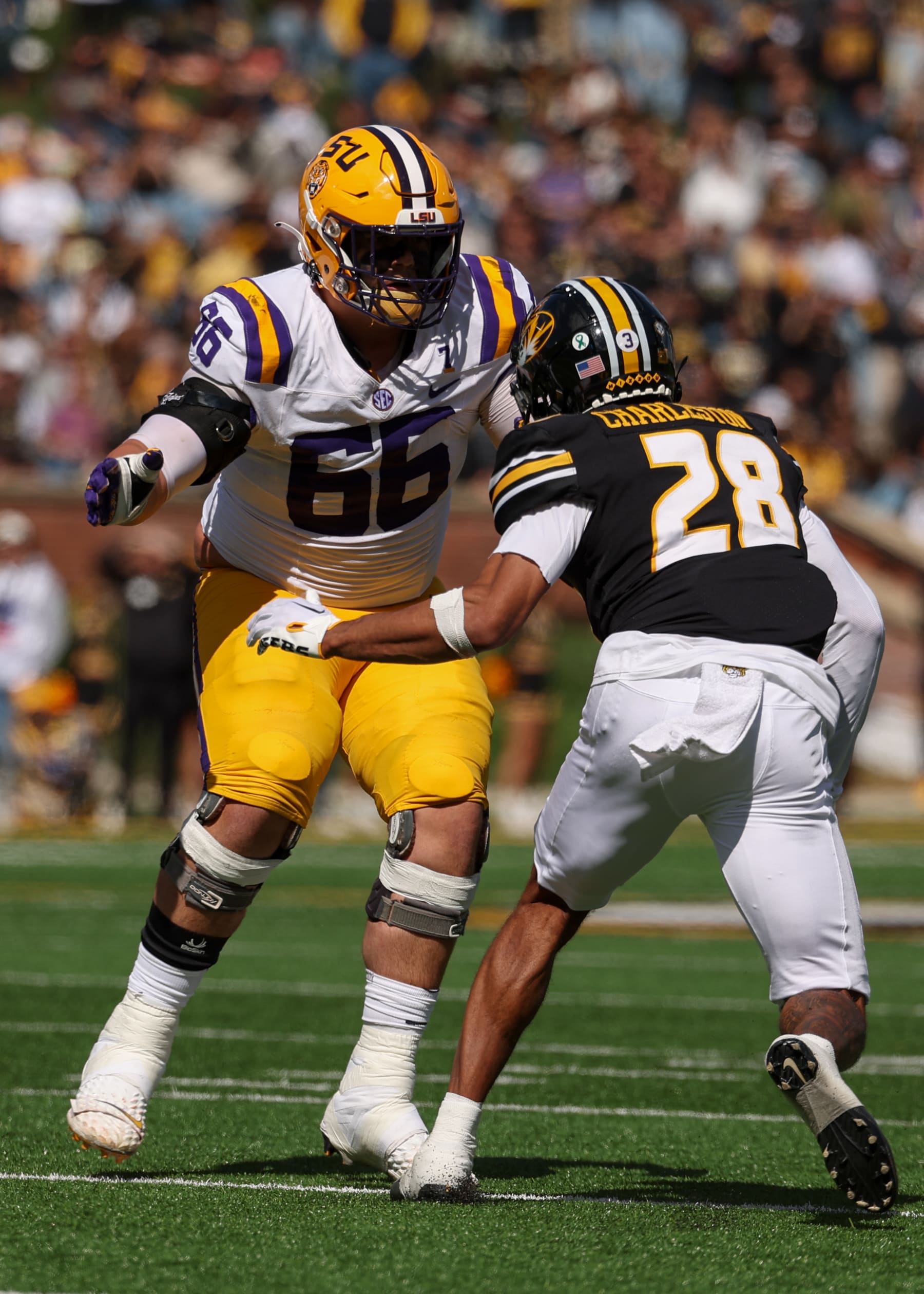 COLUMBIA, MO - OCTOBER 07: LSU Tigers offensive lineman Will Campbell (66) blocks Missouri Tigers defensive back Joseph Charleston (28) in the third quarter of an SEC football game between the LSU Tigers and Missouri Tigers on Oct 7, 2023 at Memorial Stadium in Columbia, MO. (Photo by Scott Winters/Icon Sportswire via Getty Images)