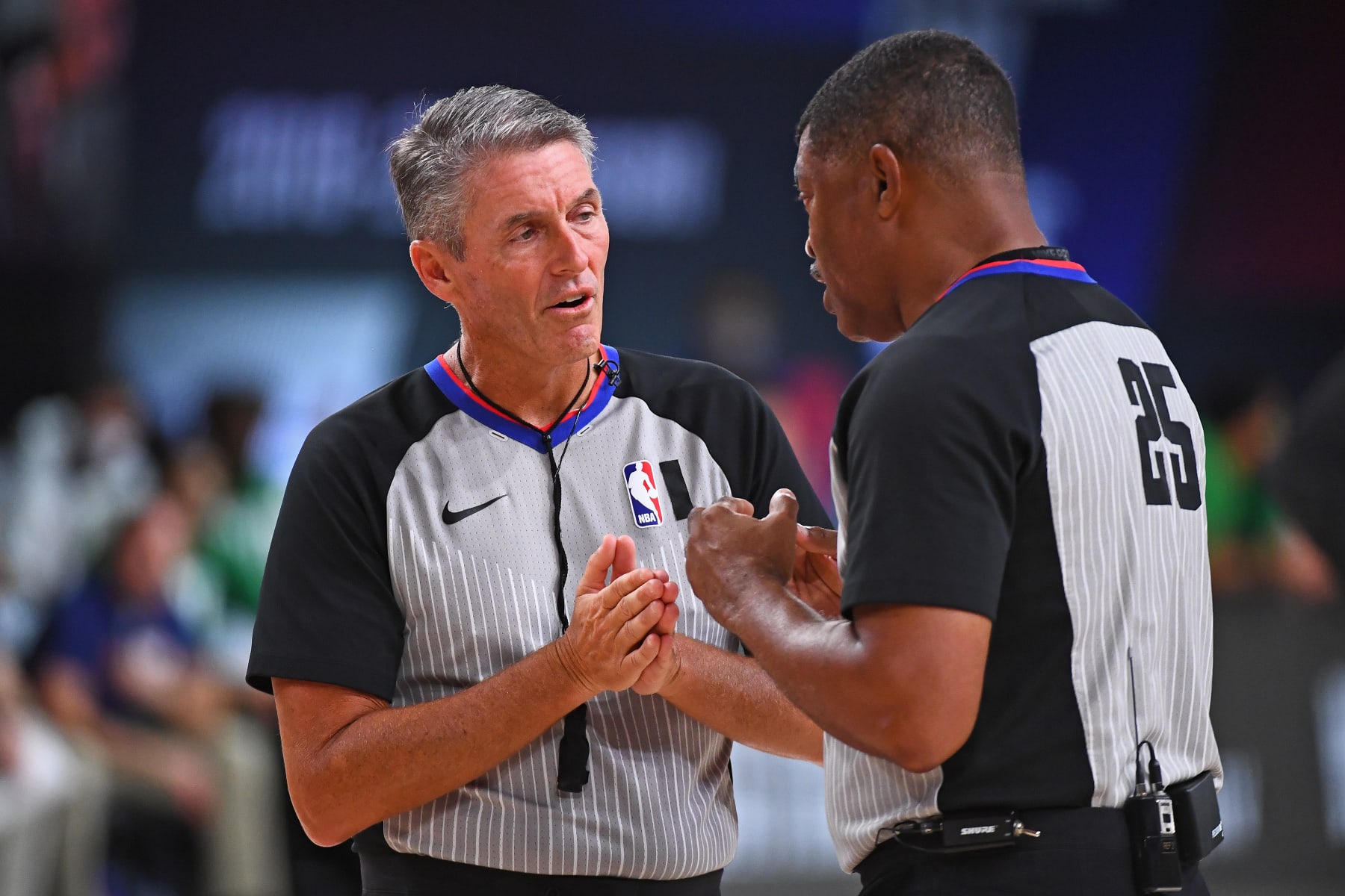 ORLANDO, FL - SEPTEMBER 23: Referees, Scott Foster and Tony Brothers share a conversation during the game between the Boston Celtics and the Miami Heat during Game Four of the Eastern Conference Finals on September 23, 2020 in Orlando, Florida at AdventHealth Arena. NOTE TO USER: User expressly acknowledges and agrees that, by downloading and/or using this Photograph, user is consenting to the terms and conditions of the Getty Images License Agreement. Mandatory Copyright Notice: Copyright 2020 NBAE (Photo by Garrett Ellwood/NBAE via Getty Images)