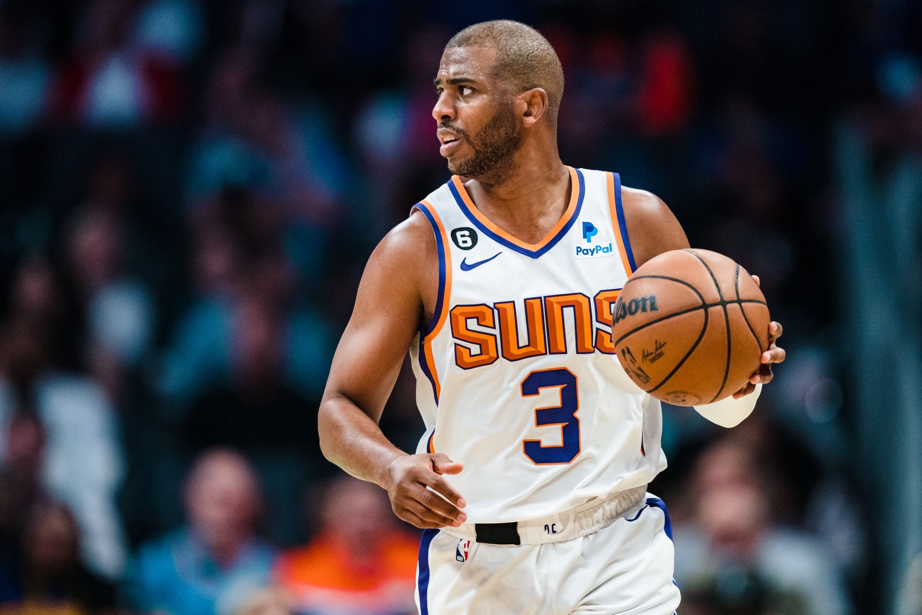 CHARLOTTE, NORTH CAROLINA - MARCH 01: Chris Paul #3 of the Phoenix Suns brings the ball up court against the Charlotte Hornets during their game at Spectrum Center on March 01, 2023 in Charlotte, North Carolina. NOTE TO USER: User expressly acknowledges and agrees that, by downloading and or using this photograph, User is consenting to the terms and conditions of the Getty Images License Agreement. (Photo by Jacob Kupferman/Getty Images)