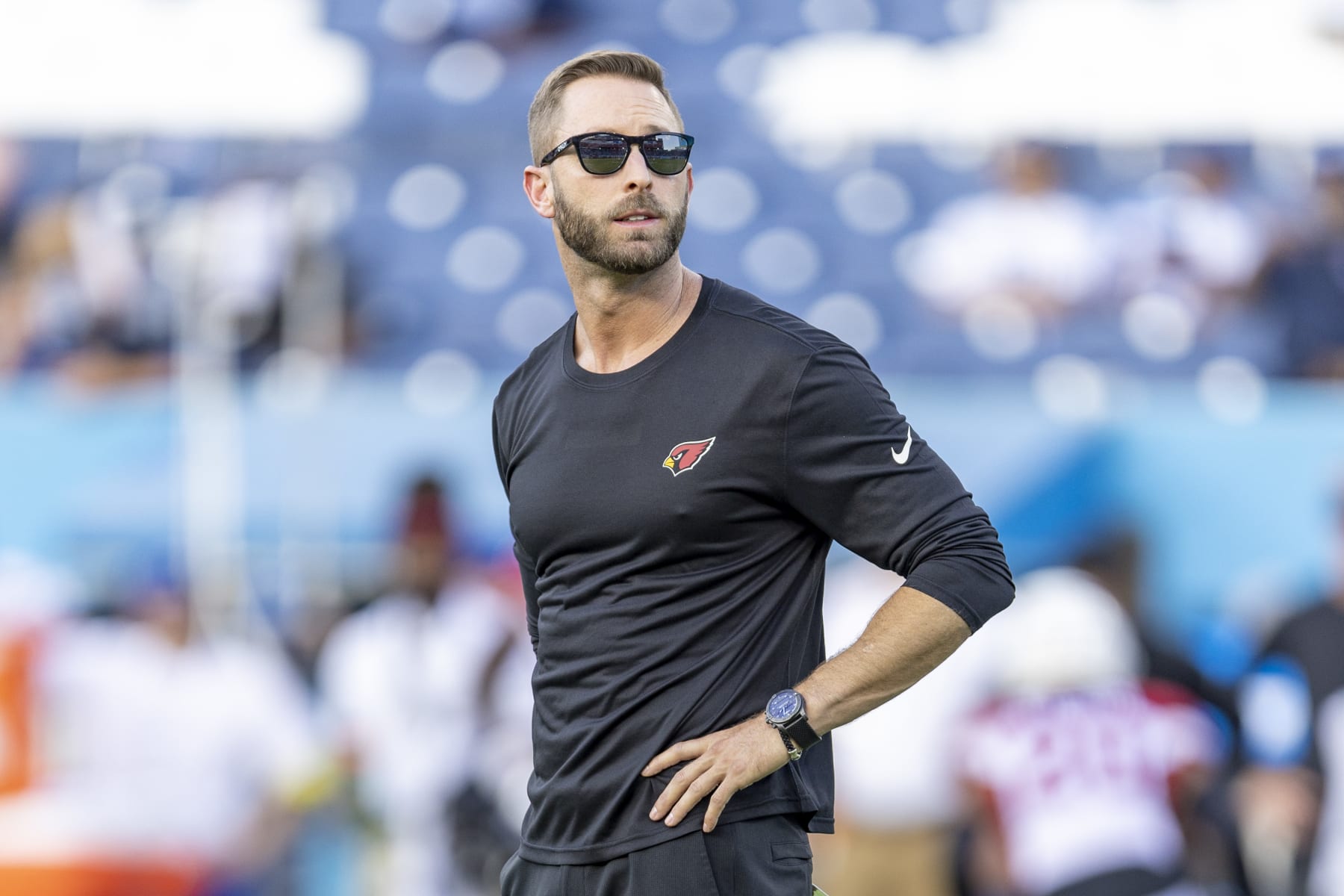 NASHVILLE, TENNESSEE - AUGUST 27: Head Coach Kliff Kingsbury of the Arizona Cardinals watches his team warm up before a preseason game against the Tennessee Titans at Nissan Stadium on August 27, 2022 in Nashville, Tennessee. The Titans defeated the Cardinals 26-23.  (Photo by Wesley Hitt/Getty Images)