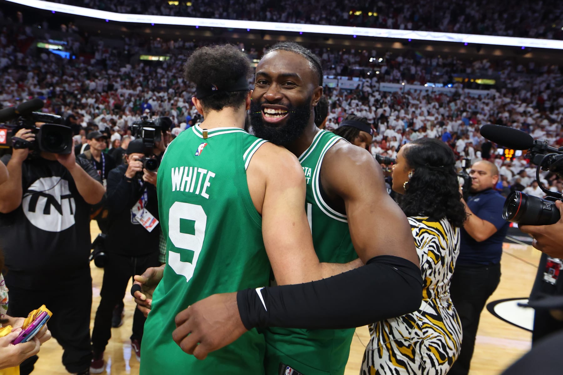 MIAMI, FLORIDA - MAY 27: Derrick White #9 and Jaylen Brown #7 of the Boston Celtics react after defeating the Miami Heat 104-103 in game six of the Eastern Conference Finals at Kaseya Center on May 27, 2023 in Miami, Florida. NOTE TO USER: User expressly acknowledges and agrees that, by downloading and or using this photograph, User is consenting to the terms and conditions of the Getty Images License Agreement. (Photo by Mike Ehrmann/Getty Images)