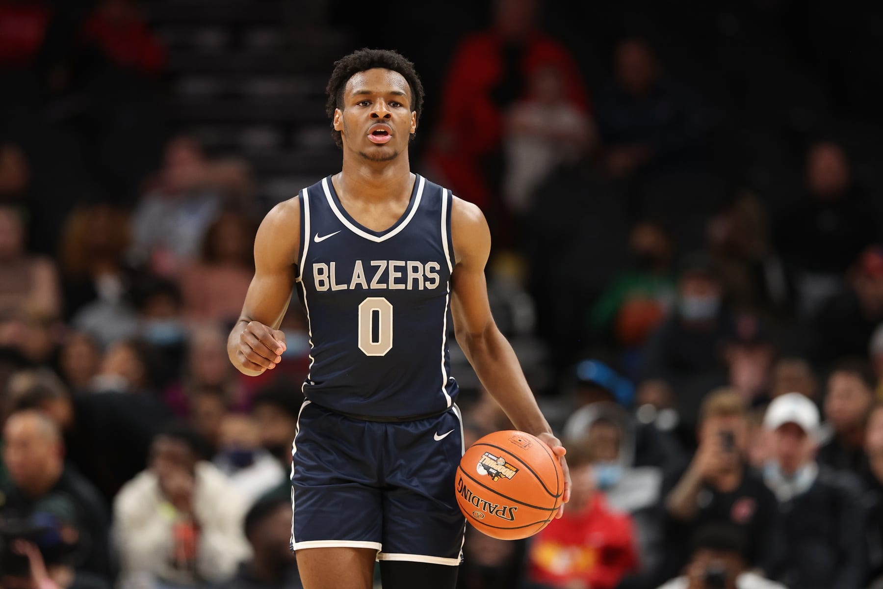 PHOENIX, ARIZONA - DECEMBER 11: Bronny James #0 of the Sierra Canyon Trailblazers handles the ball during the Hoophall West tournament against the Perry Pumas at Footprint Center on December 11, 2021 in Phoenix, Arizona. (Photo by Christian Petersen/Getty Images)