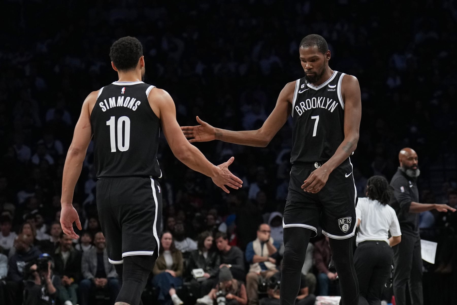 BROOKLYN, NY - OCTOBER 19: Ben Simmons #10 high fives Kevin Durant #7 of the Brooklyn Nets during the game against the New Orleans Pelicans on October 19, 2022 at Barclays Center in Brooklyn, New York. NOTE TO USER: User expressly acknowledges and agrees that, by downloading and or using this Photograph, user is consenting to the terms and conditions of the Getty Images License Agreement. Mandatory Copyright Notice: Copyright 2022 NBAE (Photo by Jesse D. Garrabrant/NBAE via Getty Images)