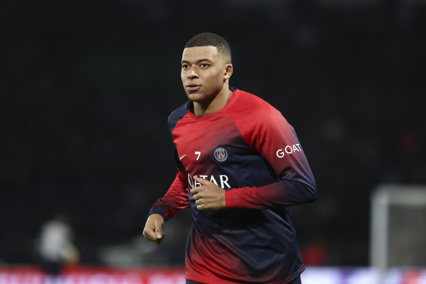 PARIS, FRANCE - FEBRUARY 14: Kylian Mbappe #7 of Paris Saint-Germain warms up before the UEFA Champions League 2023/24 round of 16 first leg match between Paris Saint-Germain and Real Sociedad at Parc des Princes on February 14, 2024 in Paris, France. (Photo by Catherine Steenkeste/Getty Images)