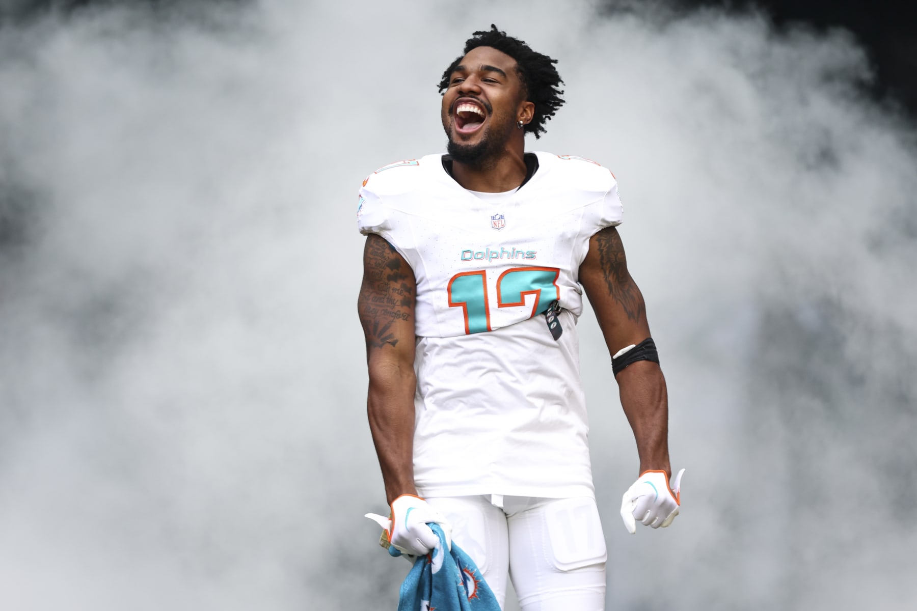 MIAMI GARDENS, FL - NOVEMBER 19: Jaylen Waddle #17 of the Miami Dolphins runs onto the field prior to an NFL football game against the Las Vegas Raiders at Hard Rock Stadium on November 19, 2023 in Miami Gardens, Florida. (Photo by Kevin Sabitus/Getty Images)