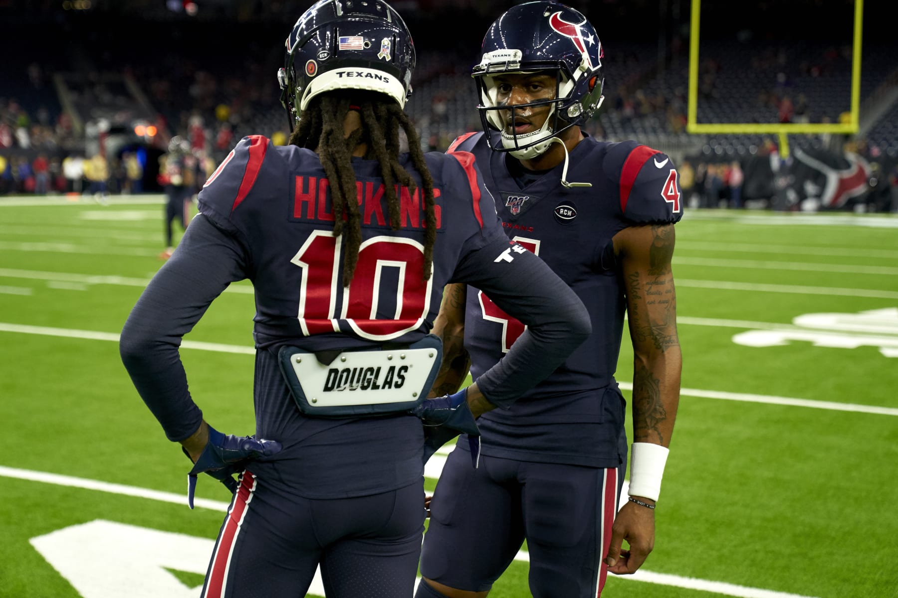 HOUSTON, TX - NOVEMBER 21: Deshaun Watson #4 of the Houston Texans visits with DeAndre Hopkins #10 of the Houston Texans before an NFL football game against the Indianapolis Colts, Thursday, Nov. 21, 2019, in Houston. (Photo by Cooper Neill/Getty Images)