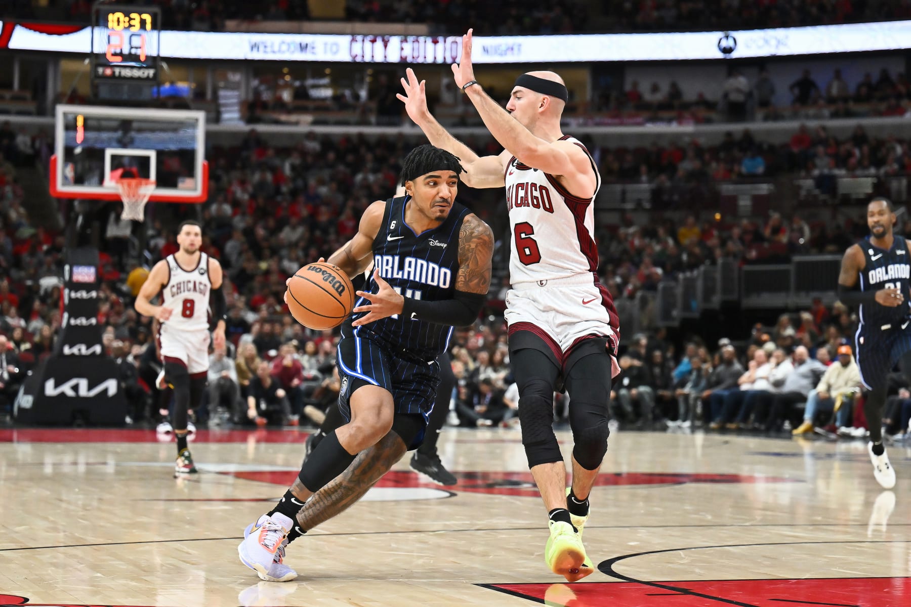 CHICAGO, ILLINOIS - NOVEMBER 18:  Gary Harris #14 of the Orlando Magic controls the ball against the Chicago Bulls on November 18, 2022 at the United Center in Chicago, Illinois. Orlando defeated Chicago 108-107.   NOTE TO USER: User expressly acknowledges and agrees that, by downloading and or using this photograph, User is consenting to the terms and conditions of the Getty Images License Agreement.  (Photo by Jamie Sabau/Getty Images)