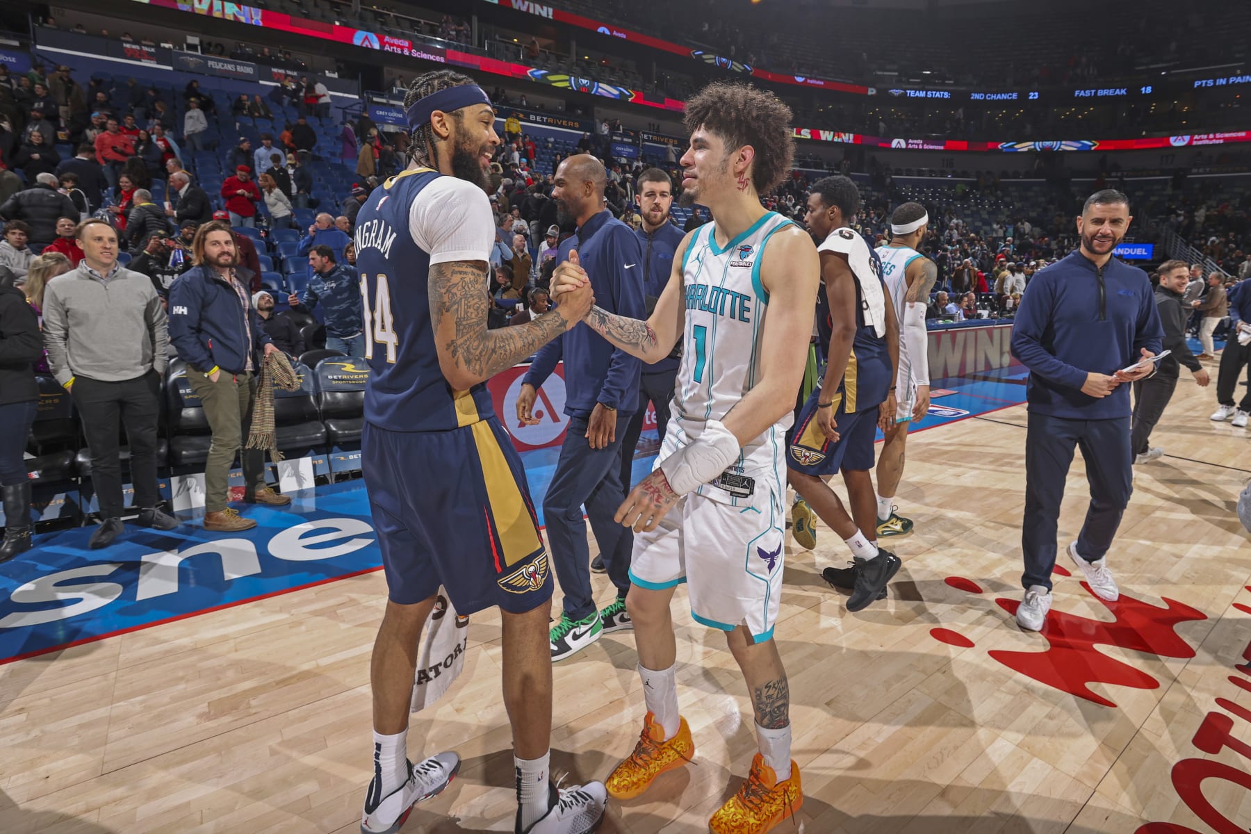 NEW ORLEANS, LA - JANUARY 17: Brandon Ingram #14 of the New Orleans Pelicans and LaMelo Ball #1 of the Charlotte Hornets high five after the game on January 17, 2024 at the Smoothie King Center in New Orleans, Louisiana. NOTE TO USER: User expressly acknowledges and agrees that, by downloading and or using this Photograph, user is consenting to the terms and conditions of the Getty Images License Agreement. Mandatory Copyright Notice: Copyright 2024 NBAE (Photo by Layne Murdoch Jr./NBAE via Getty Images)