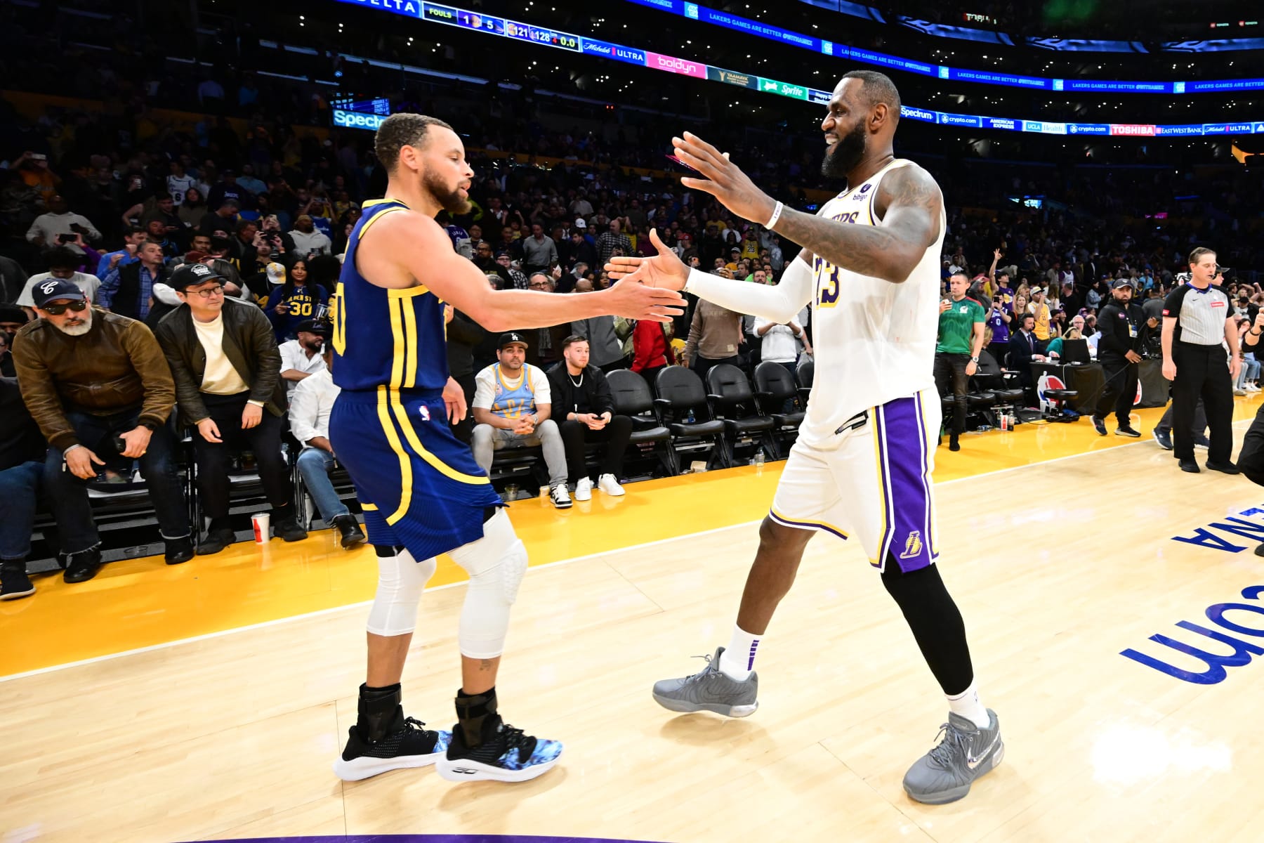 LOS ANGELES, CA - MACH 16: Stephen Curry #30 of the Golden State Warriors greets LeBron James #23 of the Los Angeles Lakers after the game  on March 16, 2024 at Crypto.Com Arena in Los Angeles, California. NOTE TO USER: User expressly acknowledges and agrees that, by downloading and/or using this Photograph, user is consenting to the terms and conditions of the Getty Images License Agreement. Mandatory Copyright Notice: Copyright 2024 NBAE (Photo by Adam Pantozzi/NBAE via Getty Images)