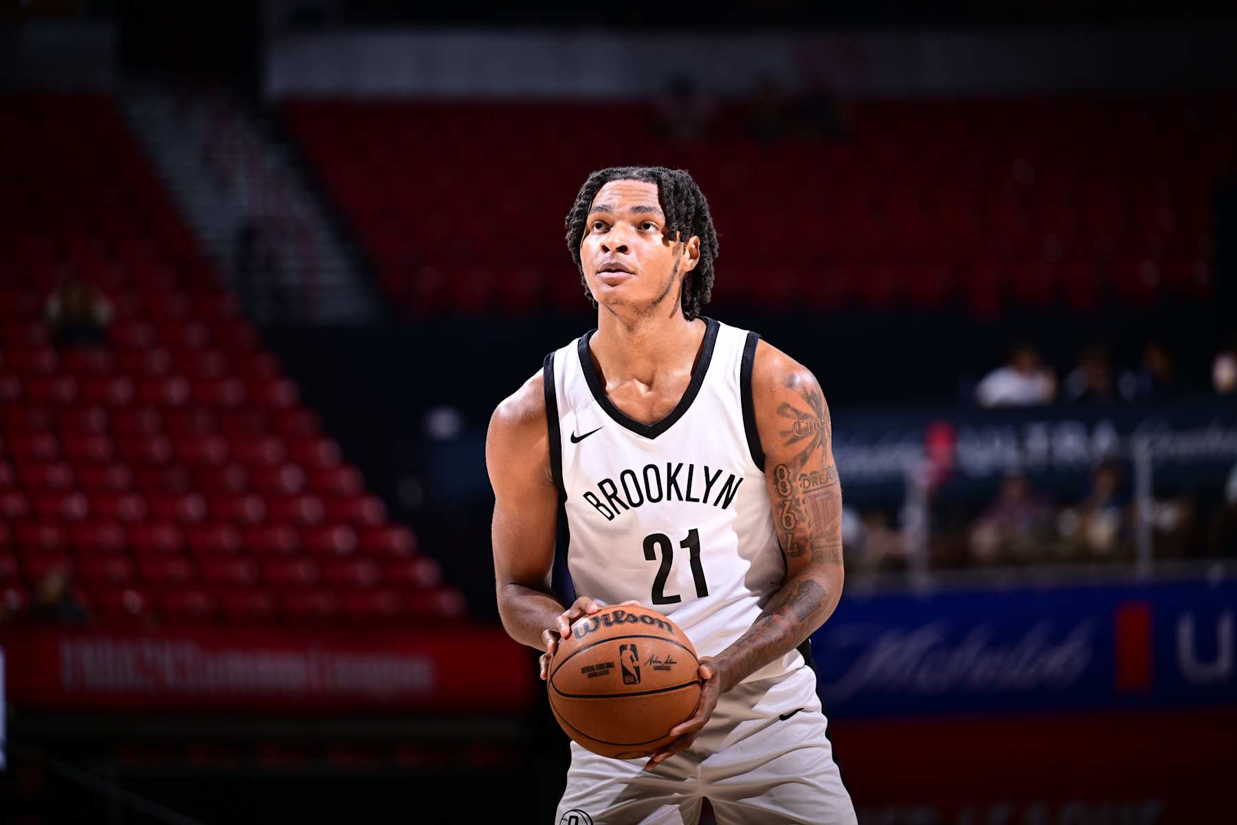 LAS VEGAS, NV - JULY 21: Noah Clowney #21 of the Brooklyn Nets prepares to shoot a free throw against the Charlotte Hornets on July 21, 2024 at the Thomas & Mack Center in Las Vegas, Nevada. NOTE TO USER: User expressly acknowledges and agrees that, by downloading and or using this photograph, User is consenting to the terms and conditions of the Getty Images License Agreement. Mandatory Copyright Notice: Copyright 2024 NBAE (Photo by Adam Hagy/NBAE via Getty Images)