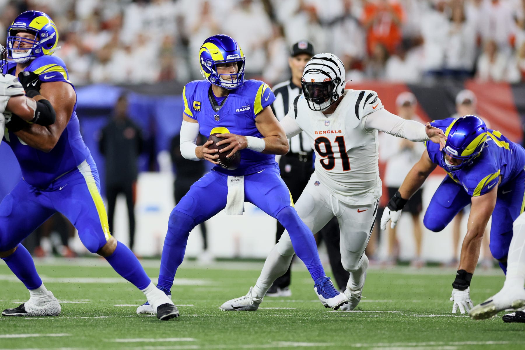 CINCINNATI, OHIO - SEPTEMBER 25: Trey Hendrickson #91 of the Cincinnati Bengals sacks Matthew Stafford #9 of the Los Angeles Rams during the third quarter in the game at Paycor Stadium on September 25, 2023 in Cincinnati, Ohio. (Photo by Andy Lyons/Getty Images)