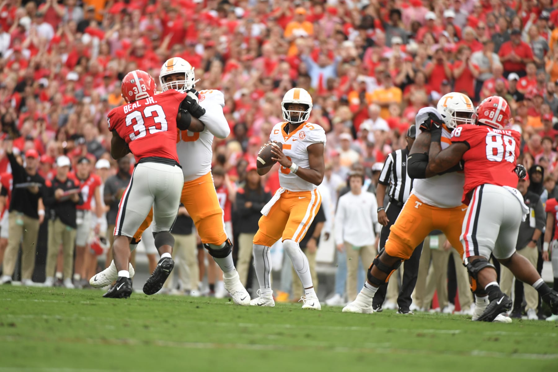 College Football: Tennessee quarterback Hendon Hooker (5) in action, drops back to pass vs Georgia at Sanford Stadium. 
Athens, GA 11/5/2022 
CREDIT: Carlos M. Saavedra (Photo by Carlos M. Saavedra/Sports Illustrated via Getty Images) 
(Set Number: X164231)